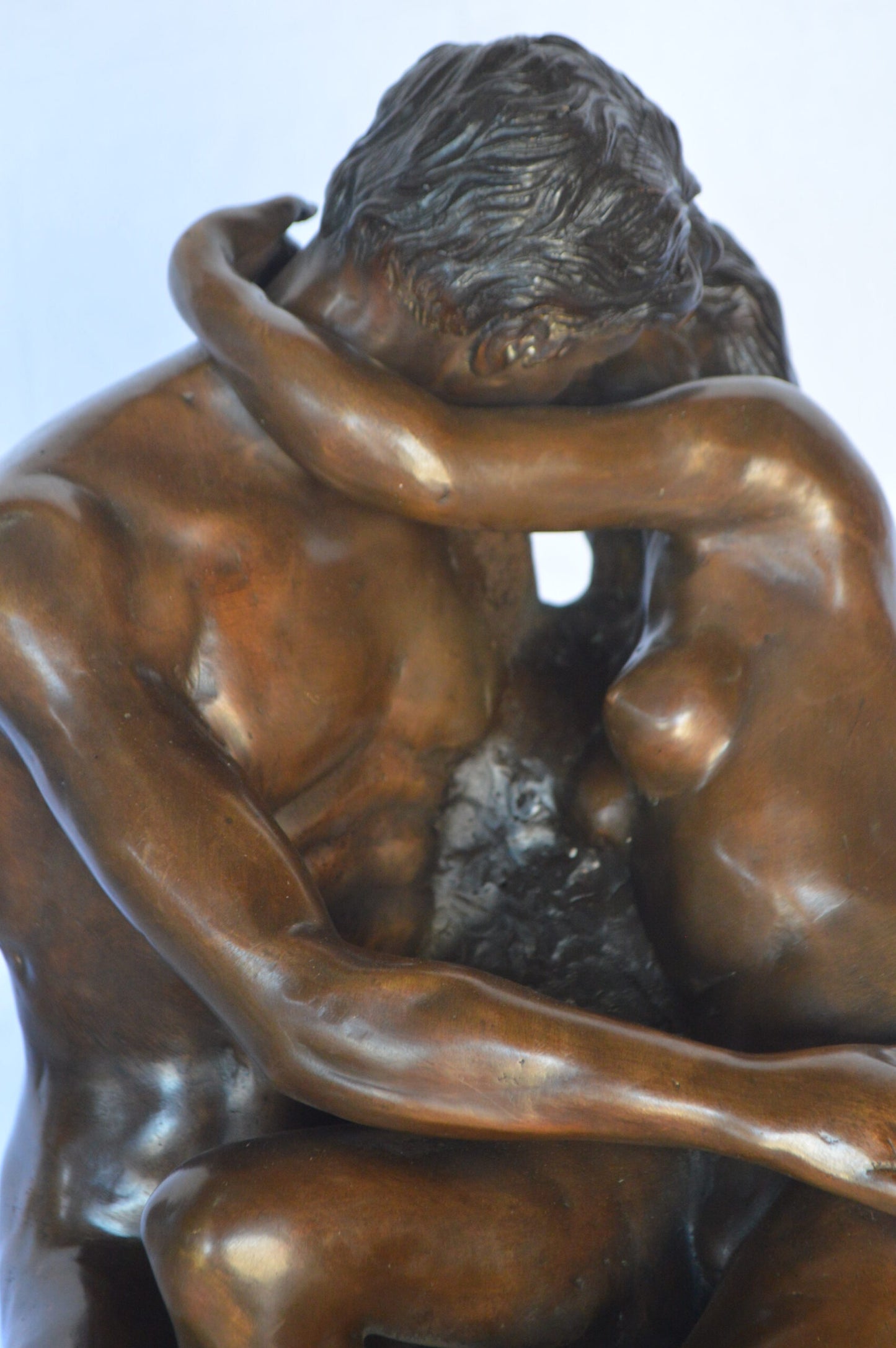 The Kiss replica by Rodin Medium Bronze Statue - Size: 15"L x 14"W x 22"H.