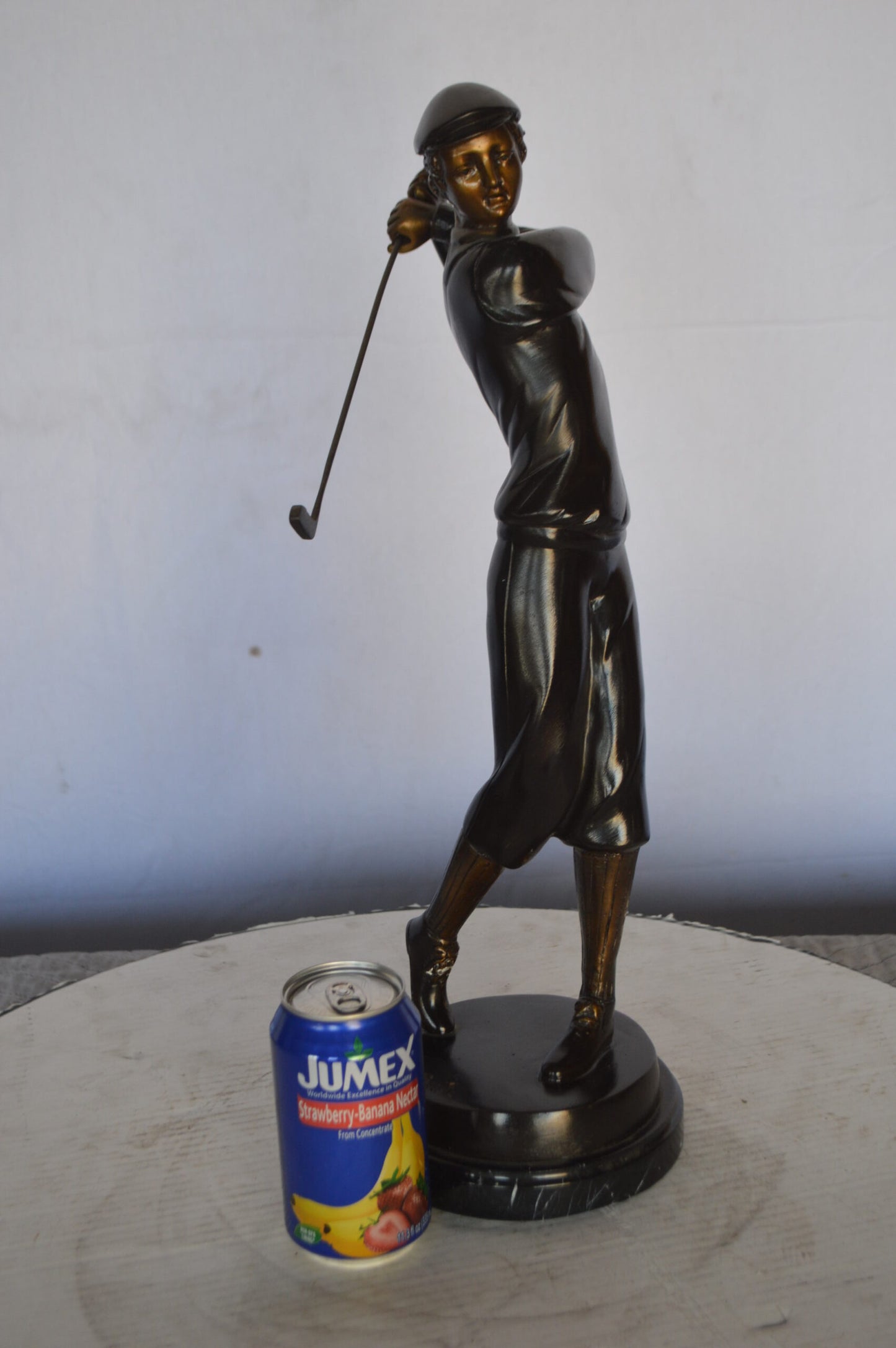 Young Golfer Bronze Statue mounted on a Marble Base - Size: 8"L x 6"W x 19"H.