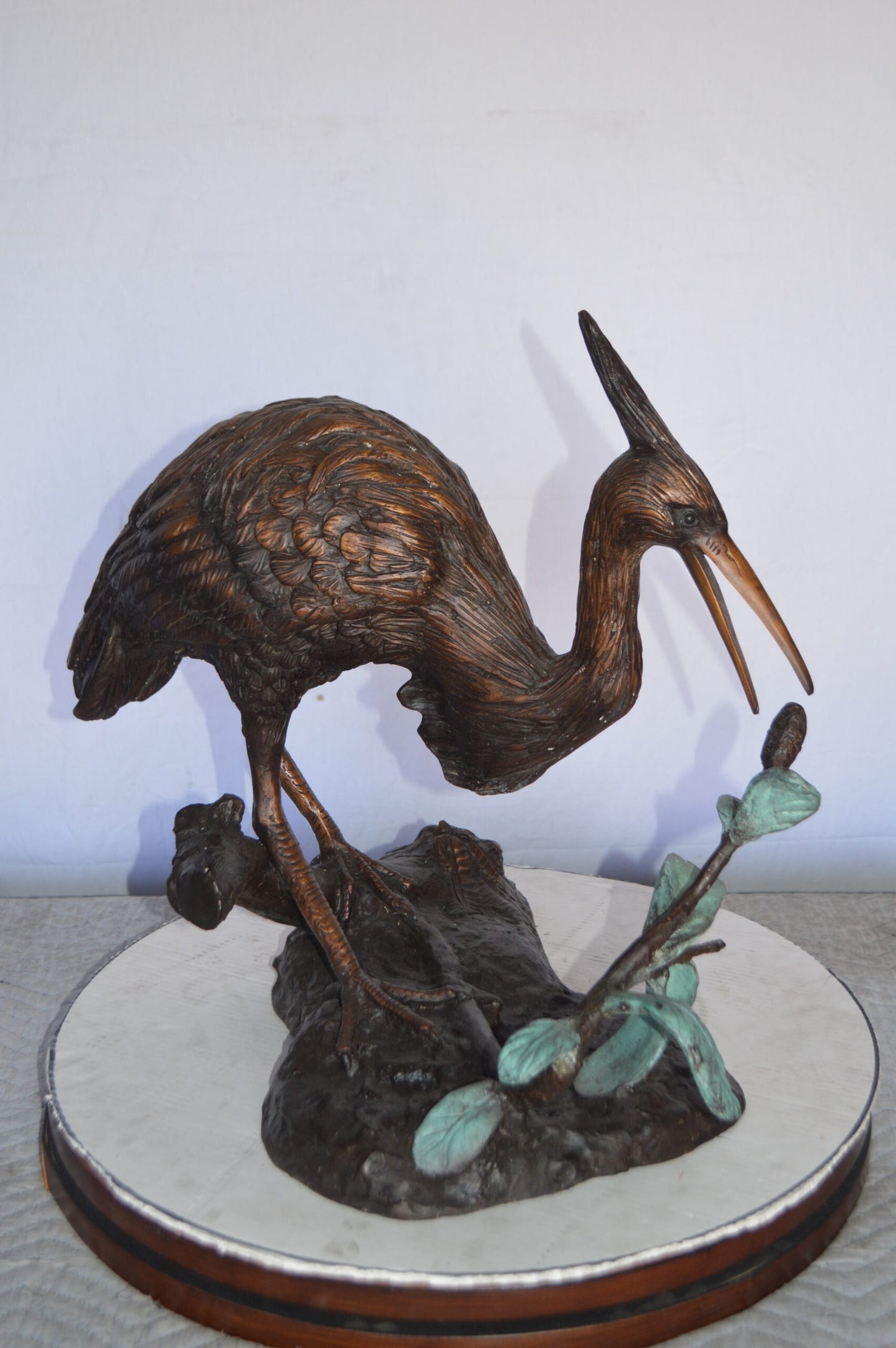 Crane on a Tree Bronze Statue -  Size: 24"L x 20"W x 21"H.