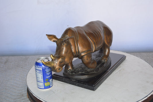 Rhino Bronze Statue Mounted  on a Marble Base -  Size: 21"L x 9"W x 10"H.