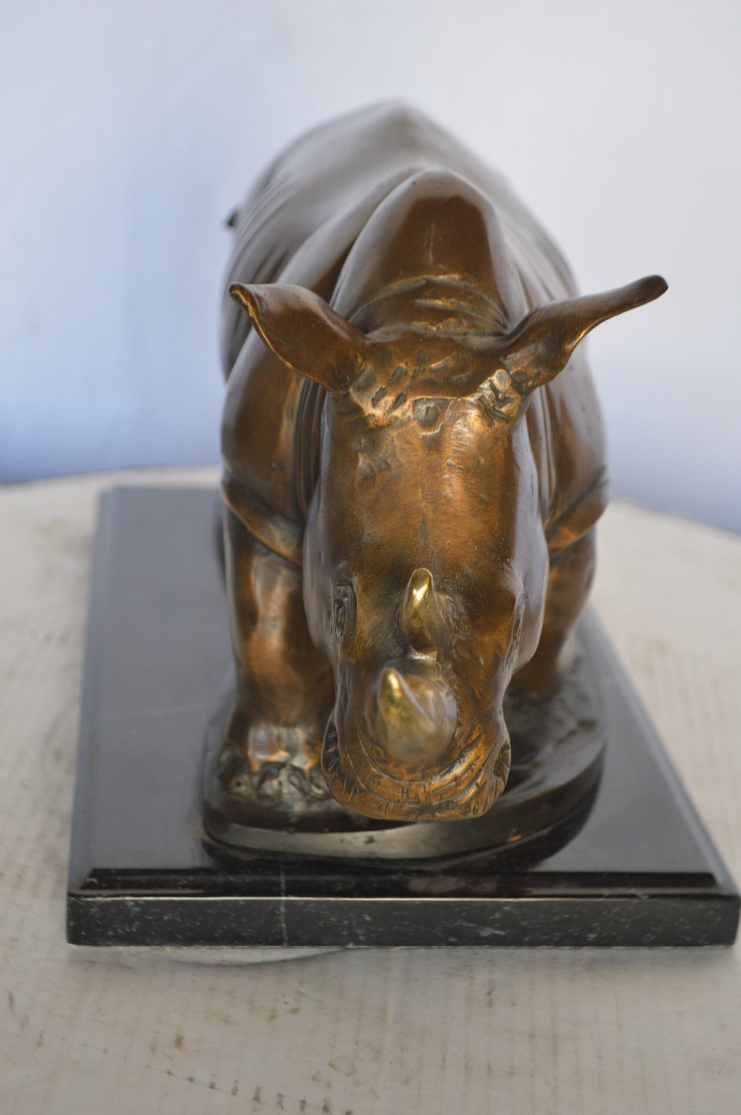 Rhino Bronze Statue Mounted on a Marble Base - Size: 21"L x 9"W x 10"H.