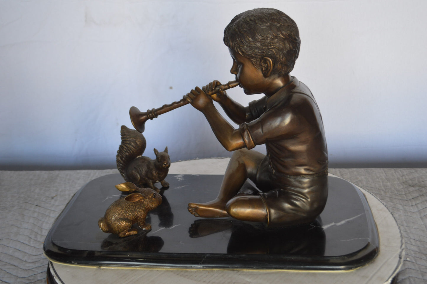 Boy With Rabbit And Squirrel Bronze Statue - Size: 22"L x 13"W x 16"H.