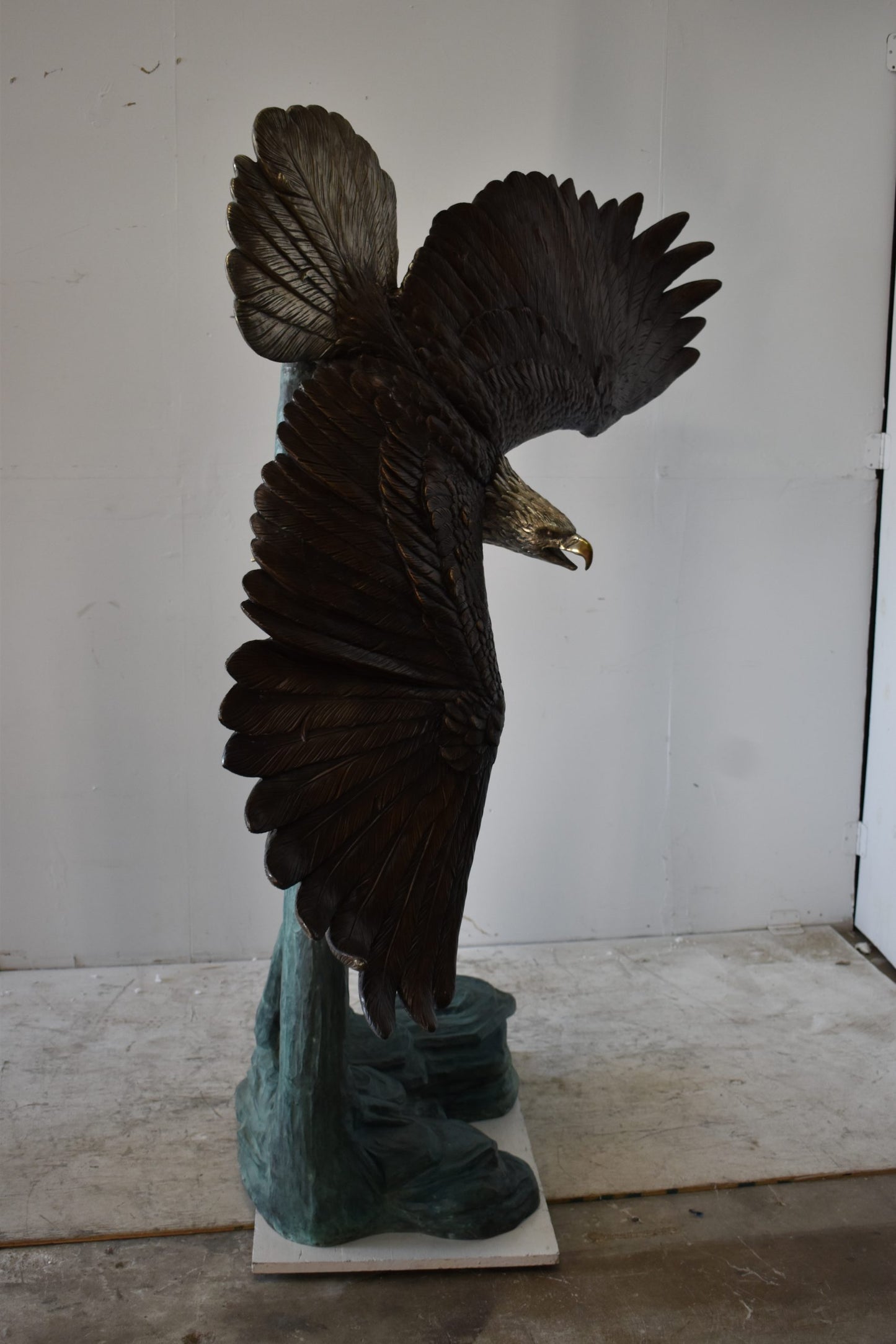 Giant Eagle in Action Looking for His Prey Bronze Statue Size: 78" x 28" x 74"H