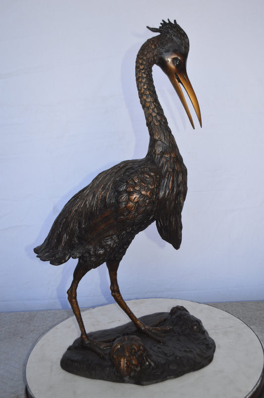 Crane Looking Down Bronze Statue - Size: 17"L x 12"W x 31"H.