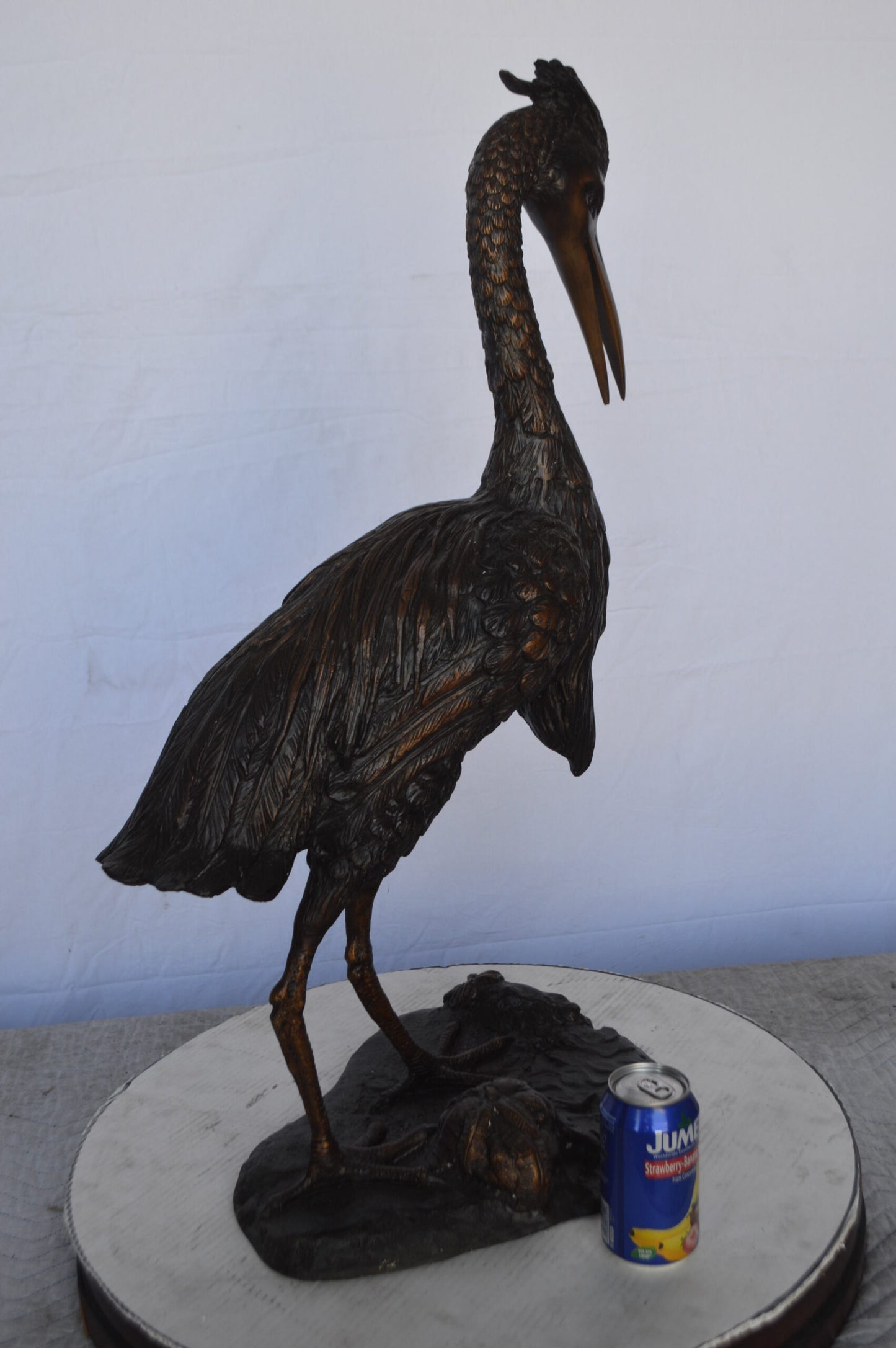 Crane Looking Down Bronze Statue -  Size: 17"L x 12"W x 31"H.