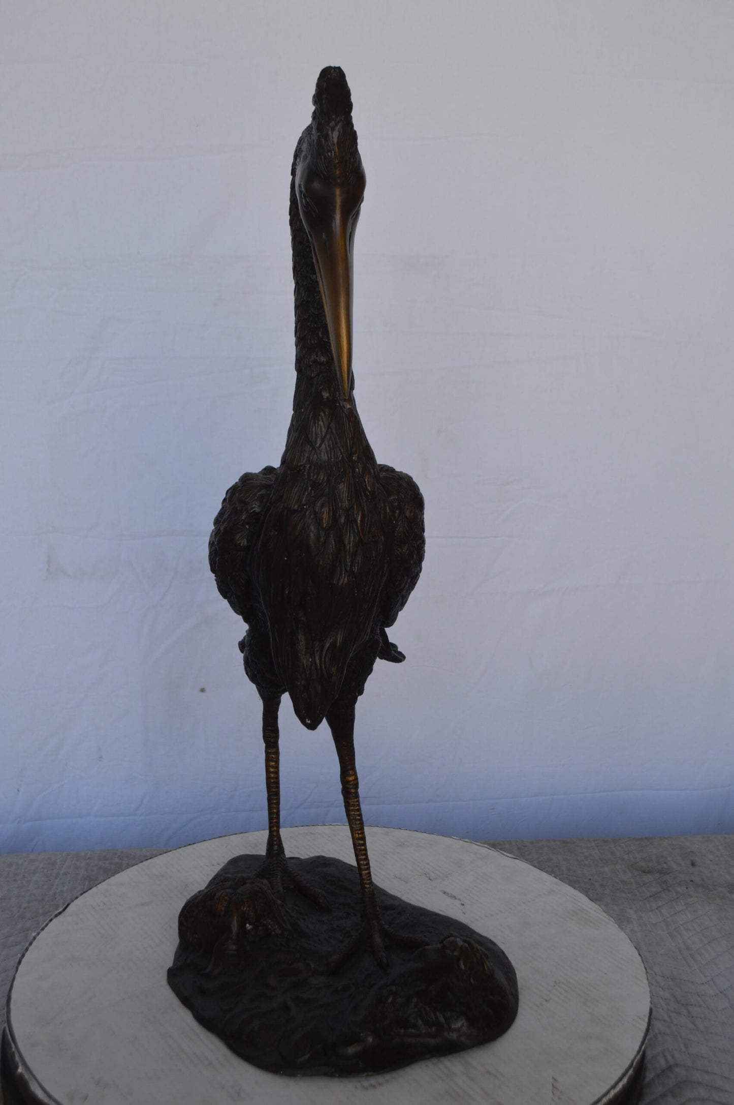 Crane Looking Down Bronze Statue - Size: 17"L x 12"W x 31"H.
