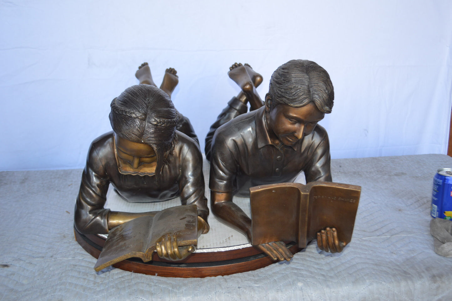 A Set of Boy and Girl Reading Books Bronze Statue -  Size: 31"L x 10"W x 14"H.