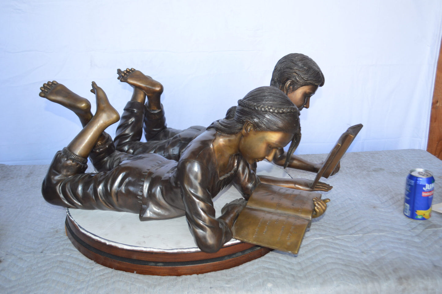 A Set of Boy and Girl Reading Books Bronze Statue -  Size: 31"L x 10"W x 14"H.