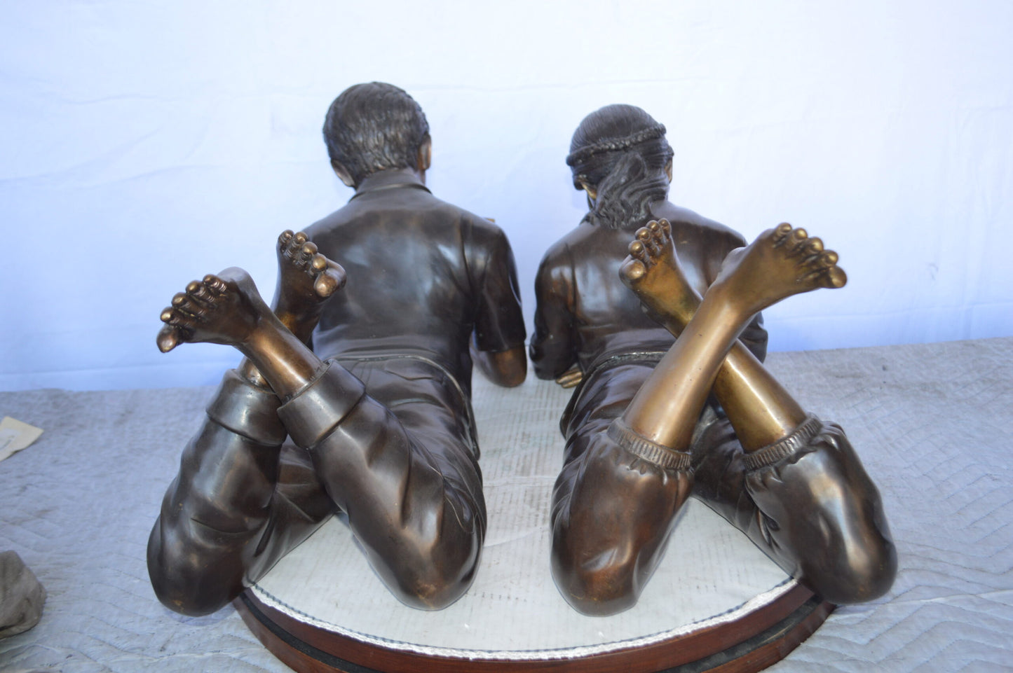 A Set of Boy and Girl Reading Books Bronze Statue -  Size: 31"L x 10"W x 14"H.