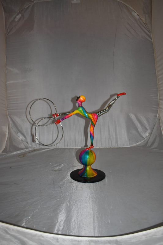 Liliana Mendez Bronze Clown on A Ball Juggling Rings Size: 21" x 8" x 18"H