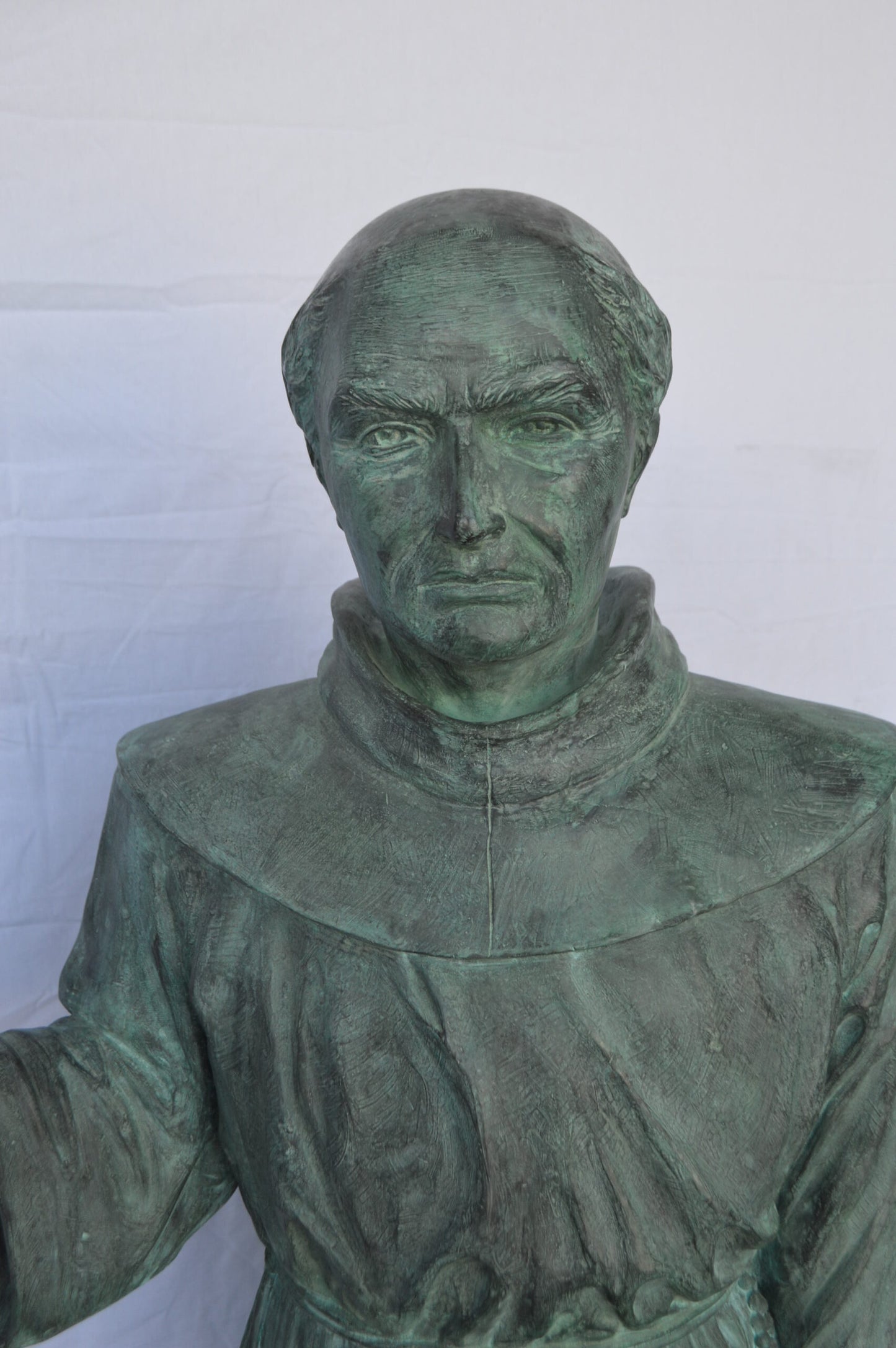 St. Serra Bronze Statue Green Patina - Size: 22"L x 19"W x 62"H.
