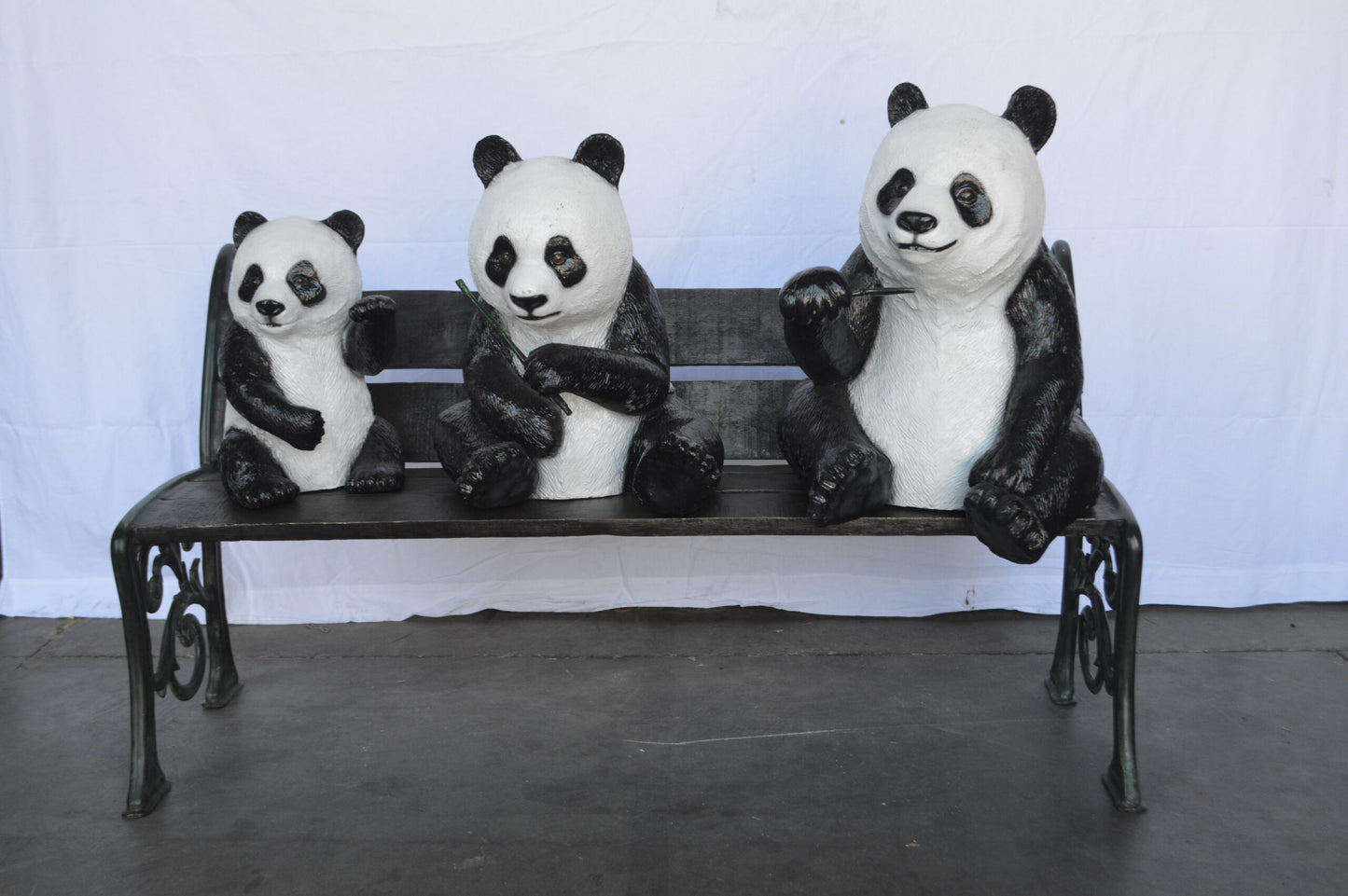 Three Panda Bears Sitting on Bench Bronze Statue -  Size: 53"L x 28"W x 36"H.