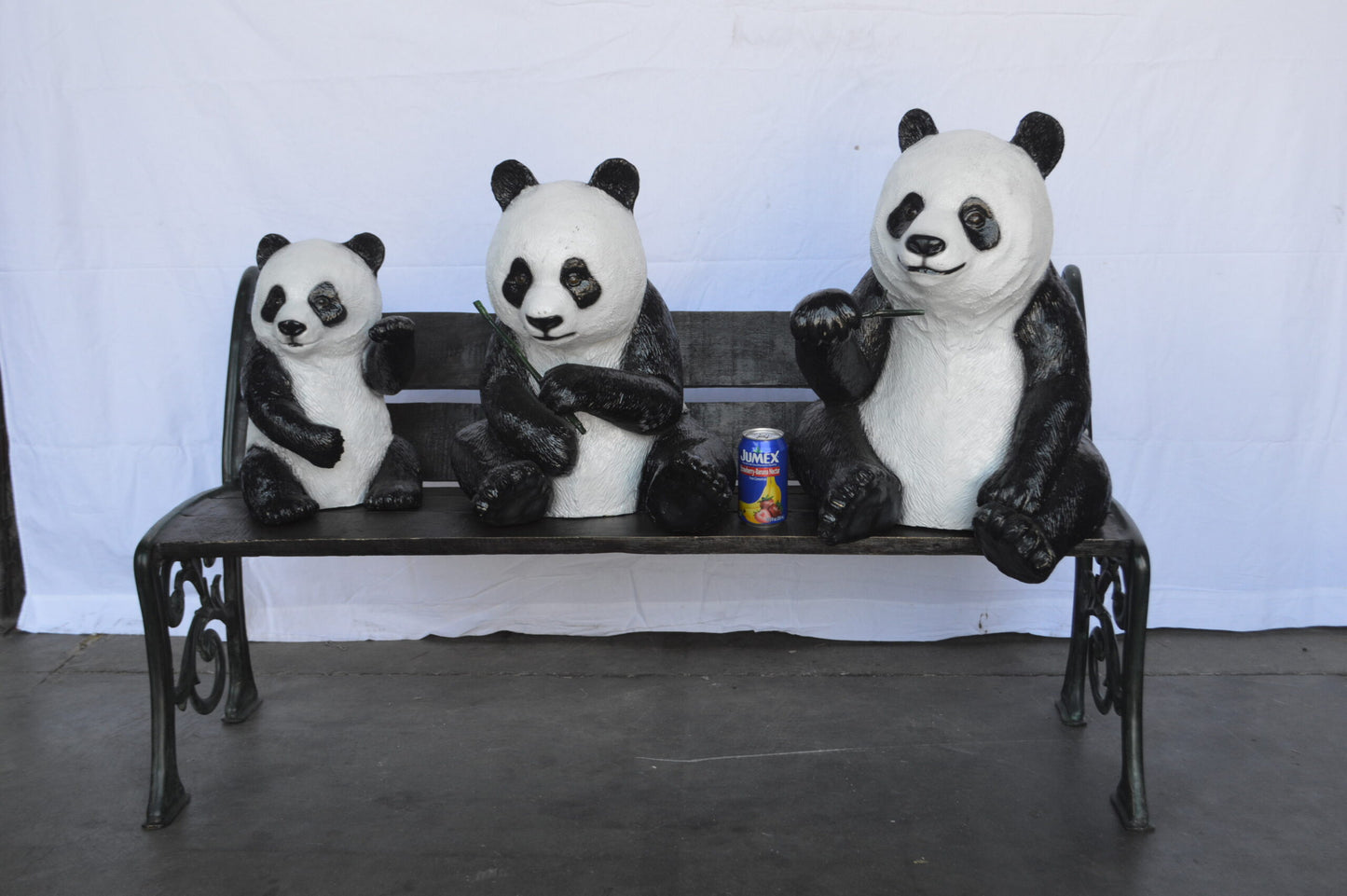 Three Panda Bears Sitting on Bench Bronze Statue - Size: 53"L x 28"W x 36"H.