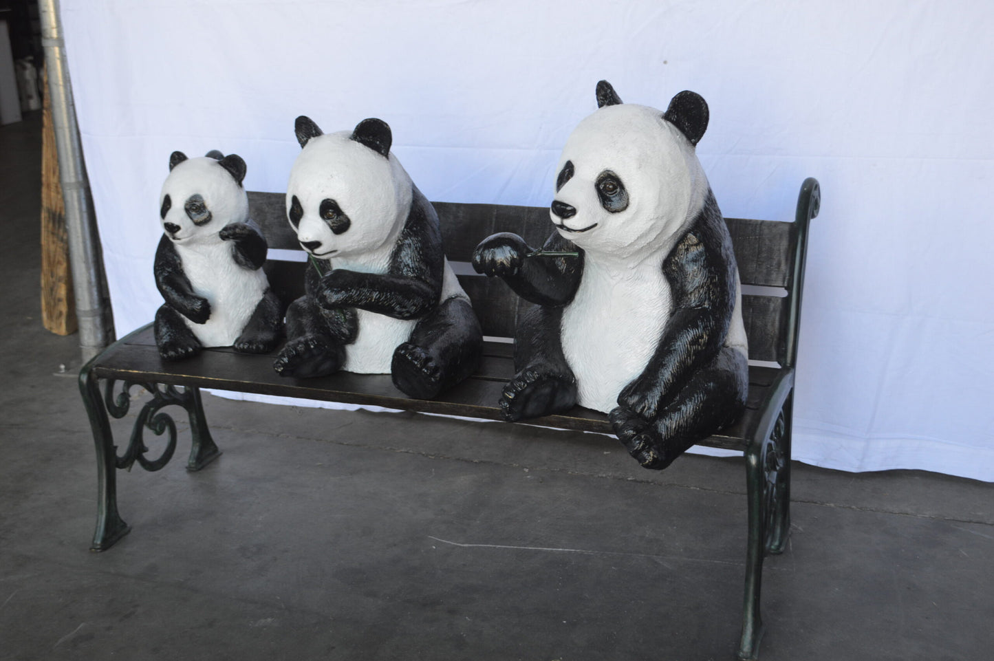 Three Panda Bears Sitting on Bench Bronze Statue - Size: 53"L x 28"W x 36"H.
