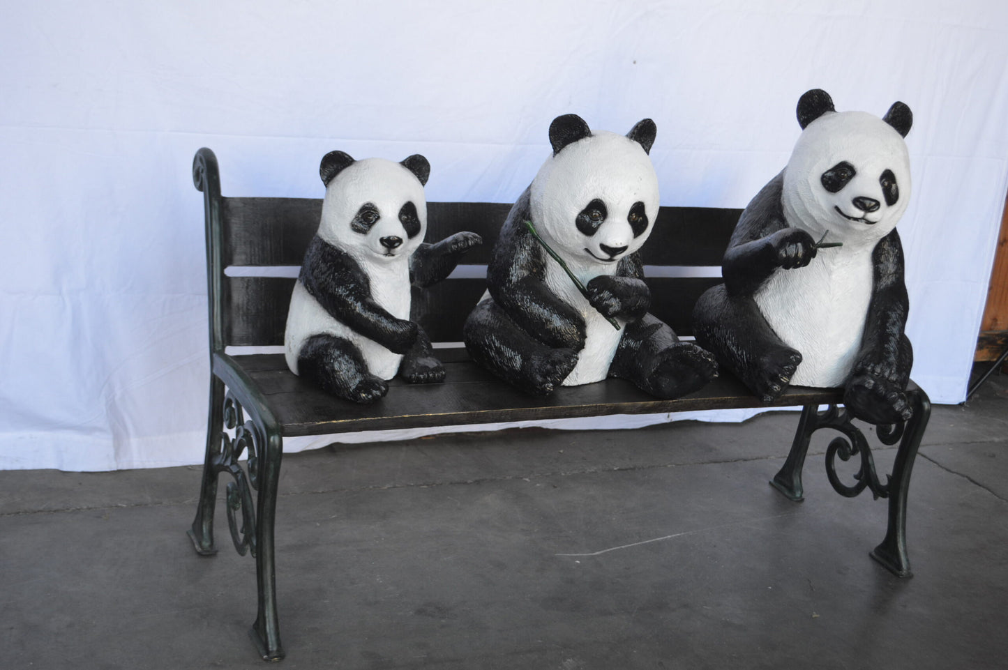 Three Panda Bears Sitting on Bench Bronze Statue - Size: 53"L x 28"W x 36"H.