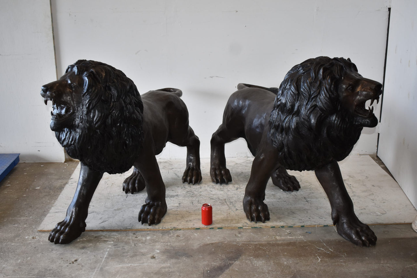 A Pair of Large Lions Walking Side by Side Bronze Statues Size: 24" x 60" x 41"H