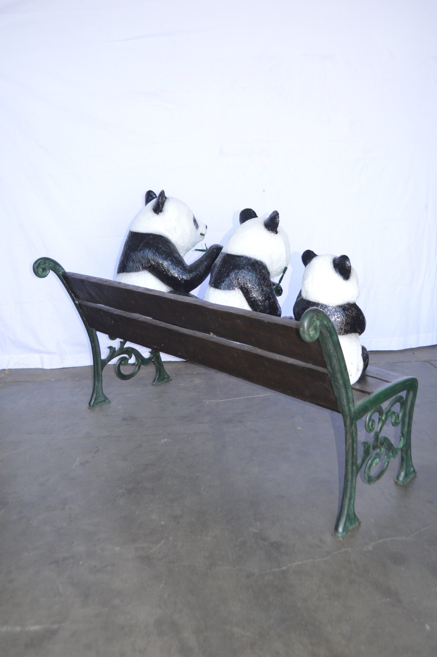 Three Panda Bears Sitting on Bench Bronze Statue - Size: 53"L x 28"W x 36"H.