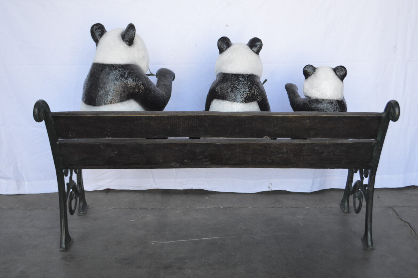 Three Panda Bears Sitting on Bench Bronze Statue - Size: 53"L x 28"W x 36"H.