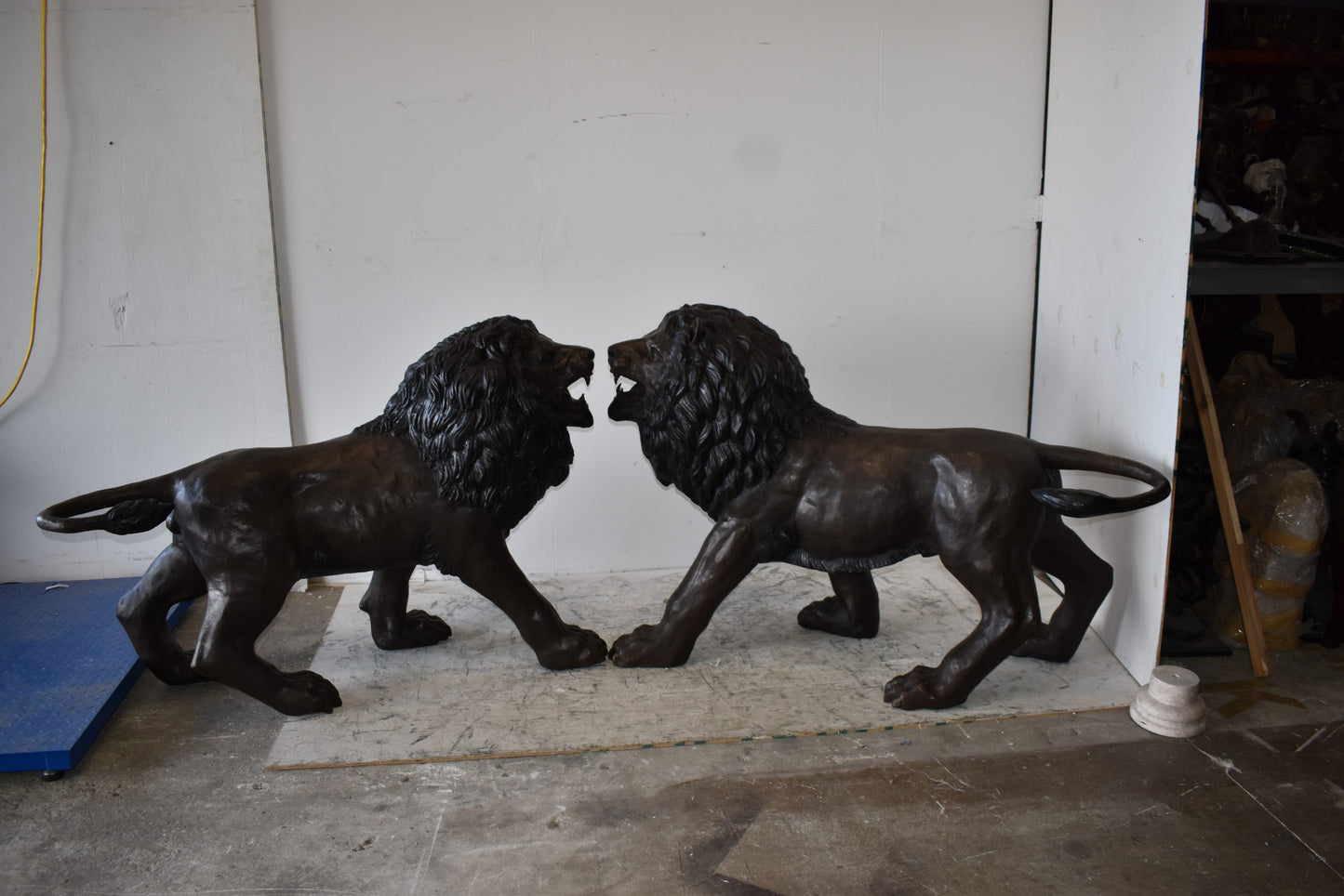 A Pair of Large Lions Walking Side by Side Bronze Statues Size: 24" x 60" x 41"H