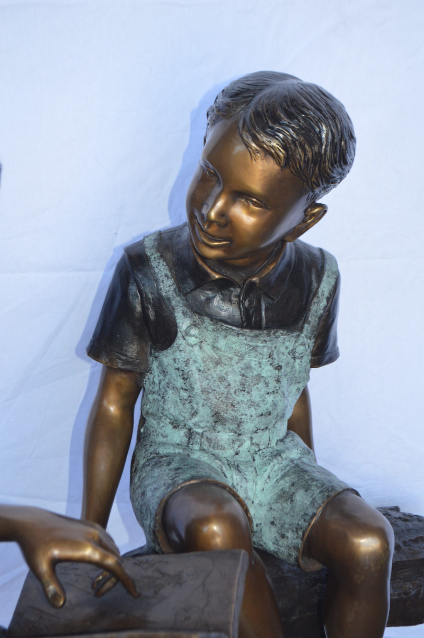 Two Kids on a tree log reading Bronze Statue Large -  Size: 44"L x 17"W x 42"H.