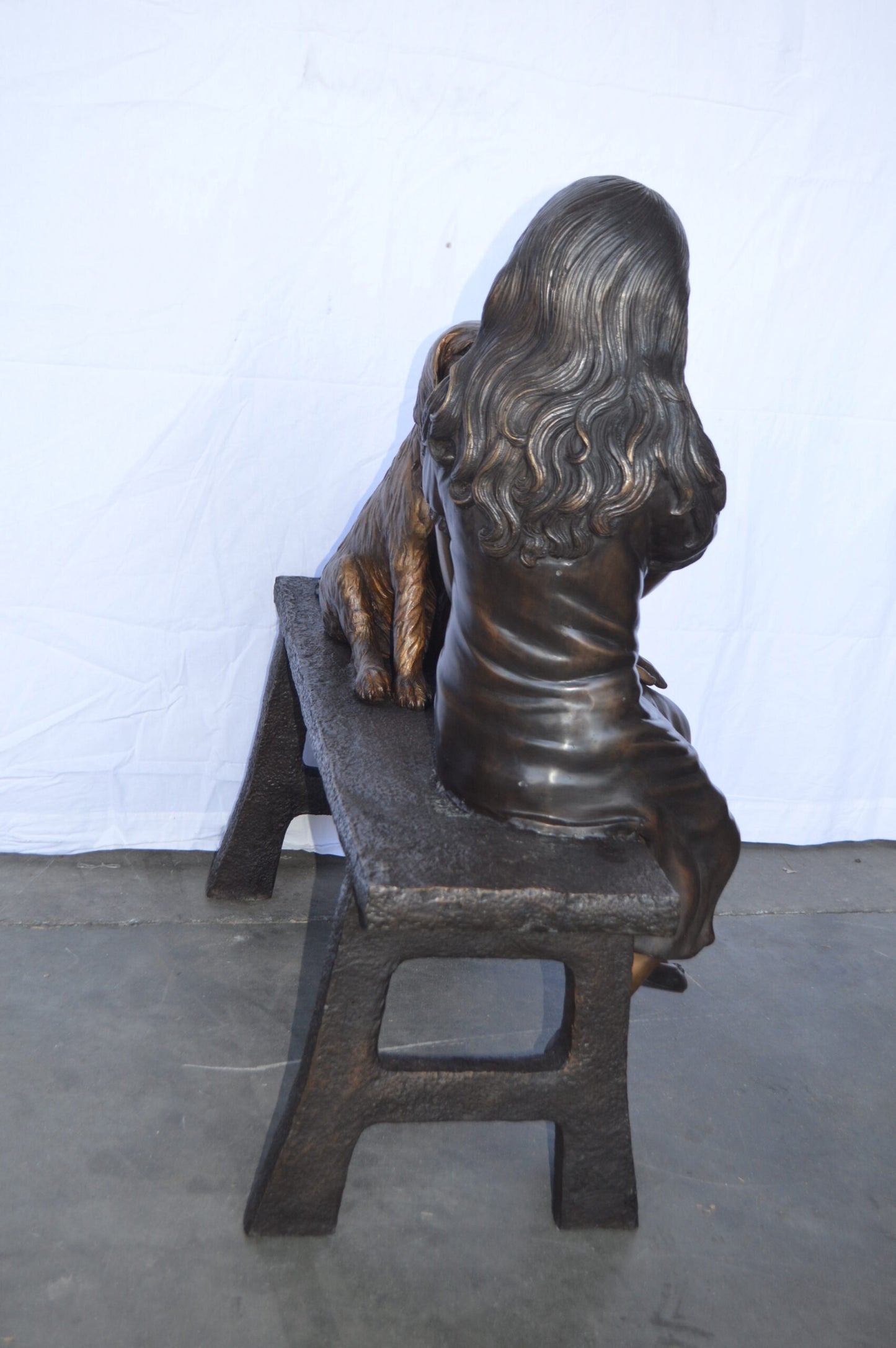 Girl plays Doctor on a Bench W Dog Bronze Statue - Size: 38"L x 18"W x 39"H.