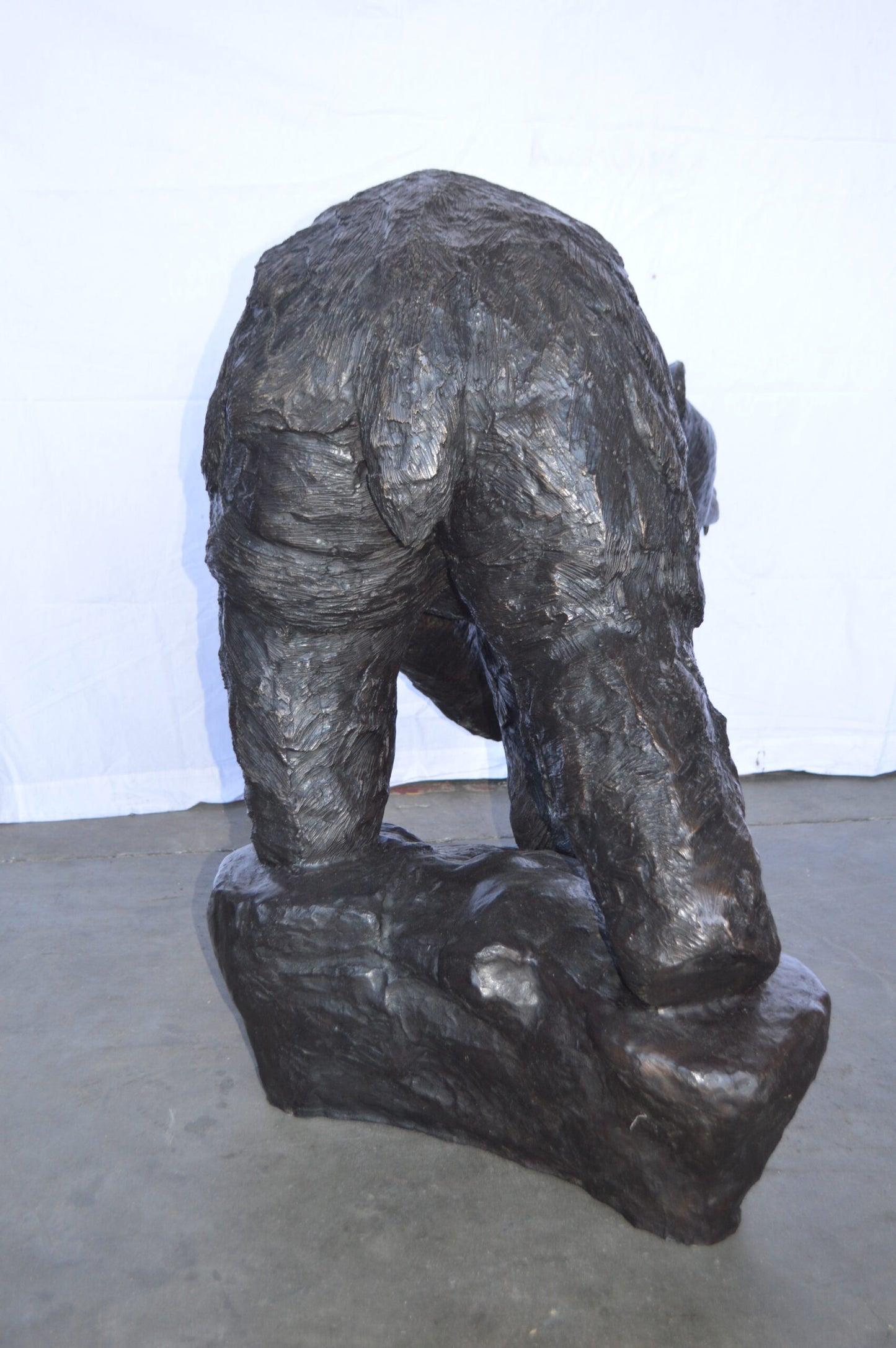 Wild Bear Walking on The Rocks Bronze Statue -  Size: 58"L x 27"W x 40"H.