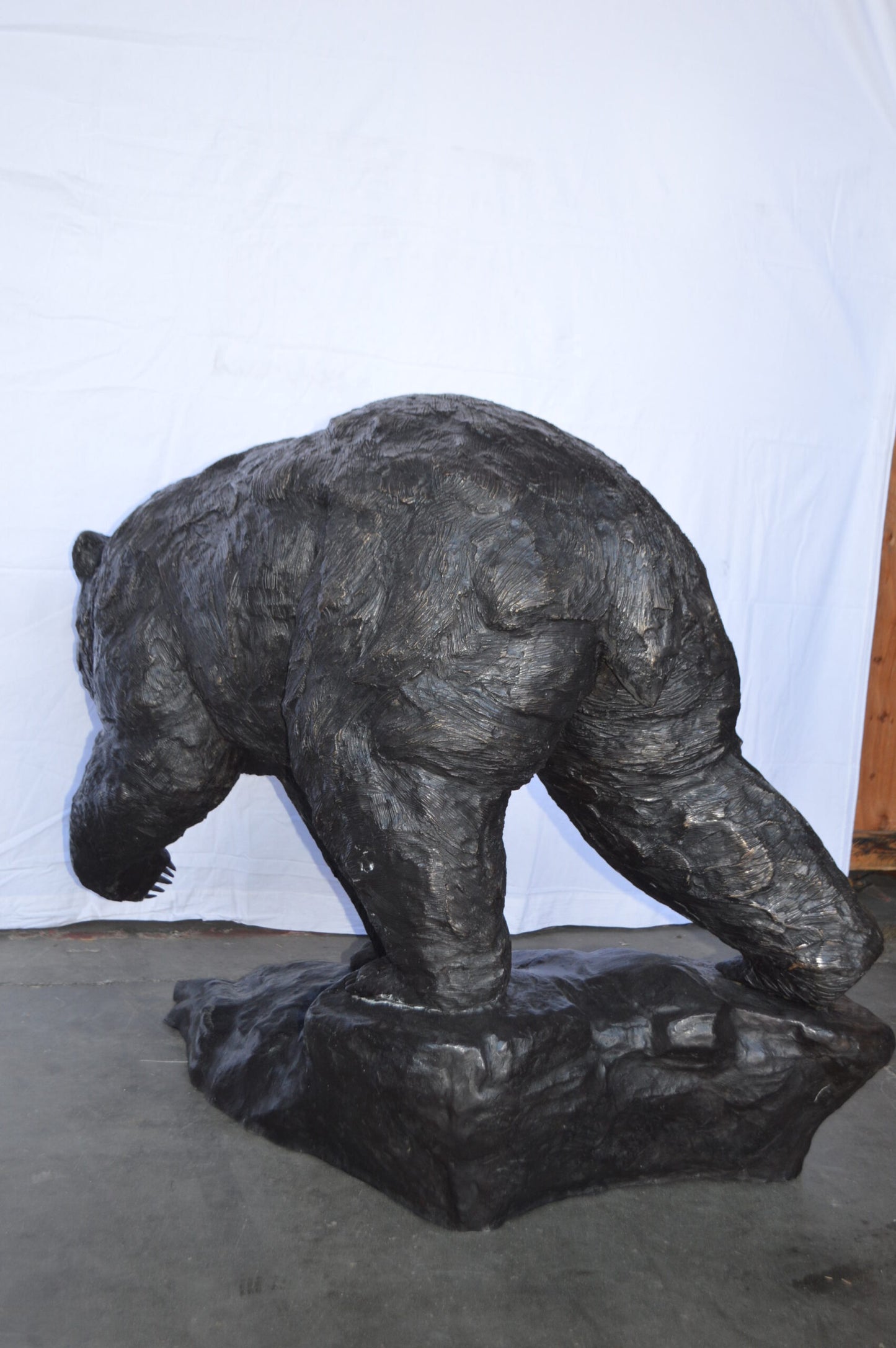 Wild Bear Walking on The Rocks Bronze Statue -  Size: 58"L x 27"W x 40"H.