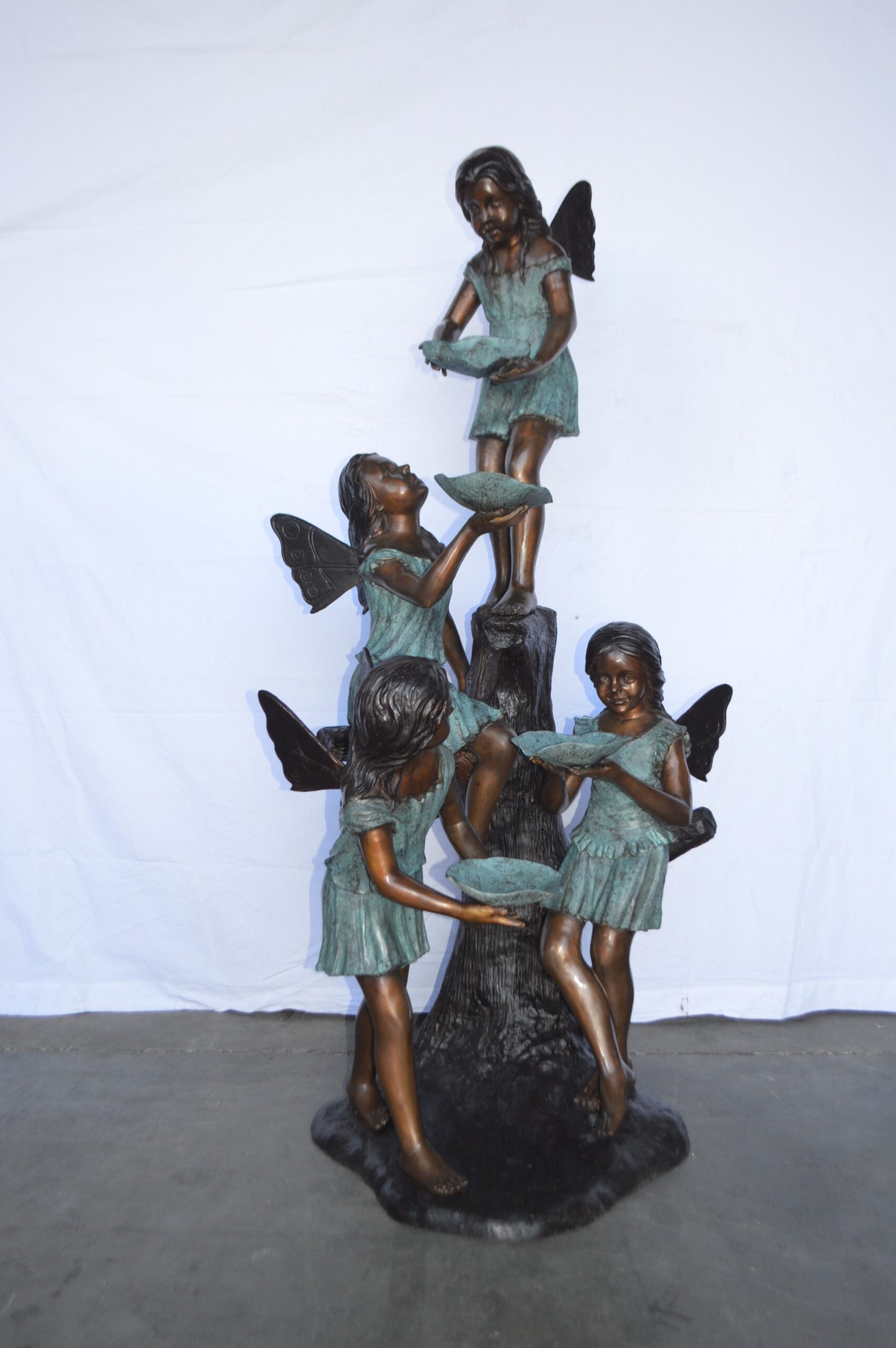 Four Angels Playing Bronze Statue Fountain  -  Size: 35"L x 28"W x 66"H.