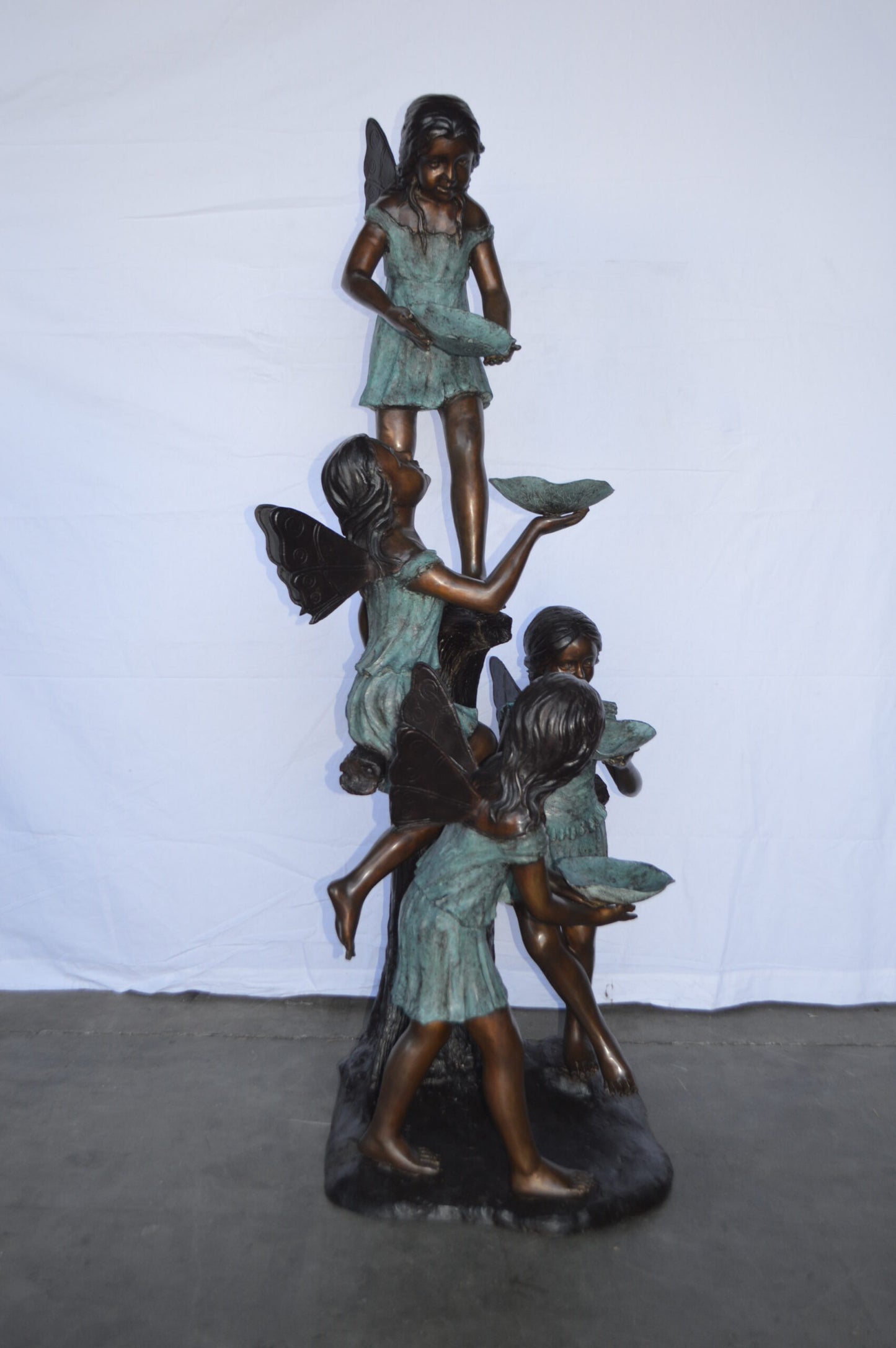 Four Angels Playing Bronze Statue Fountain  -  Size: 35"L x 28"W x 66"H.