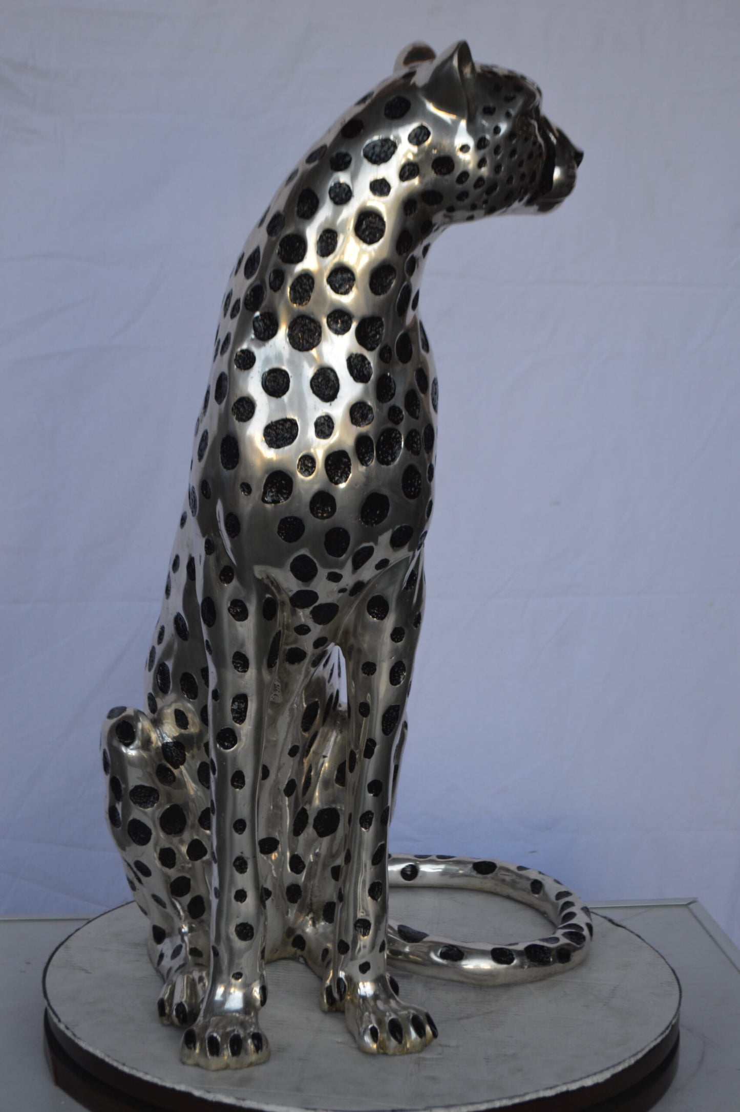 Sitting Cheetah Bronze Statue Silver Finish - Size: 21"L x 21"W x 34"H.