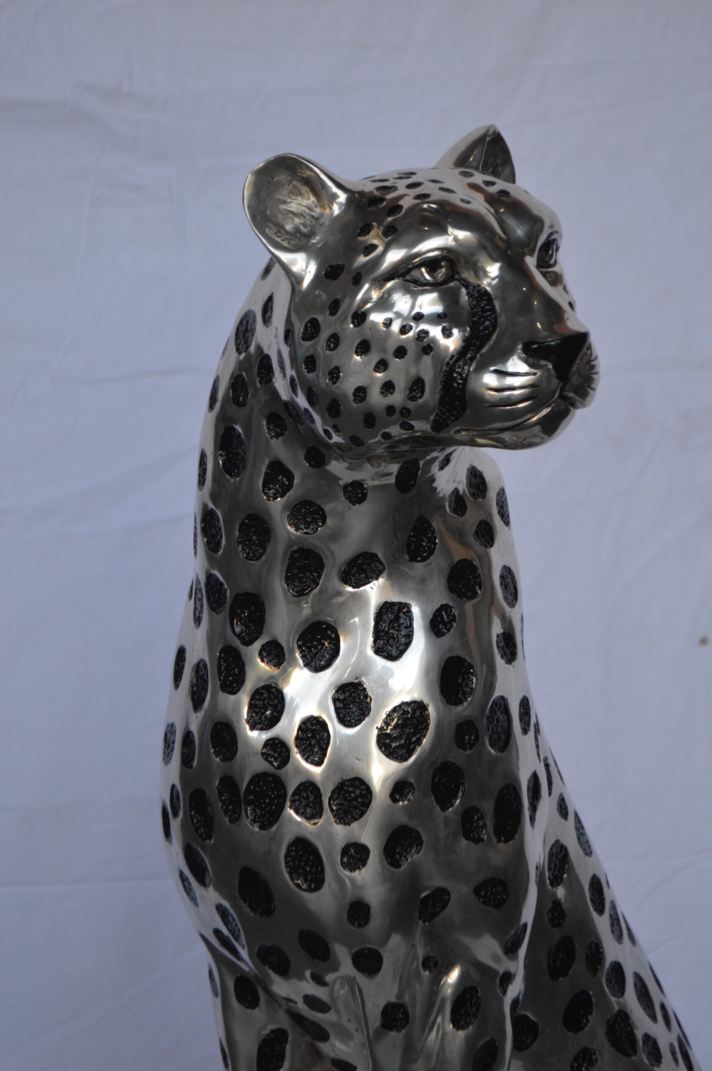 Sitting Cheetah Bronze Statue Silver Finish - Size: 21"L x 21"W x 34"H.