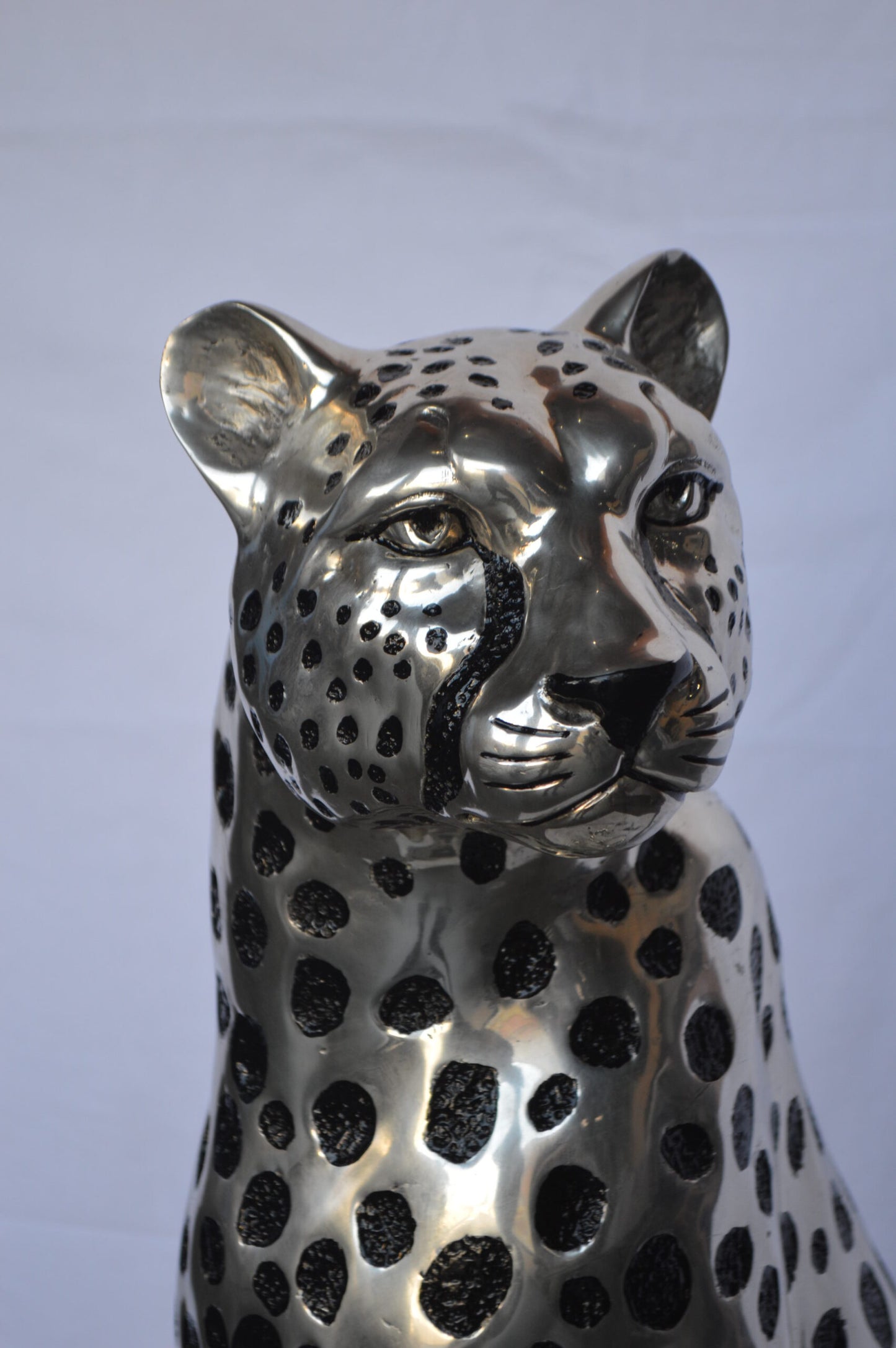 Sitting Cheetah Bronze Statue Silver Finish - Size: 21"L x 21"W x 34"H.