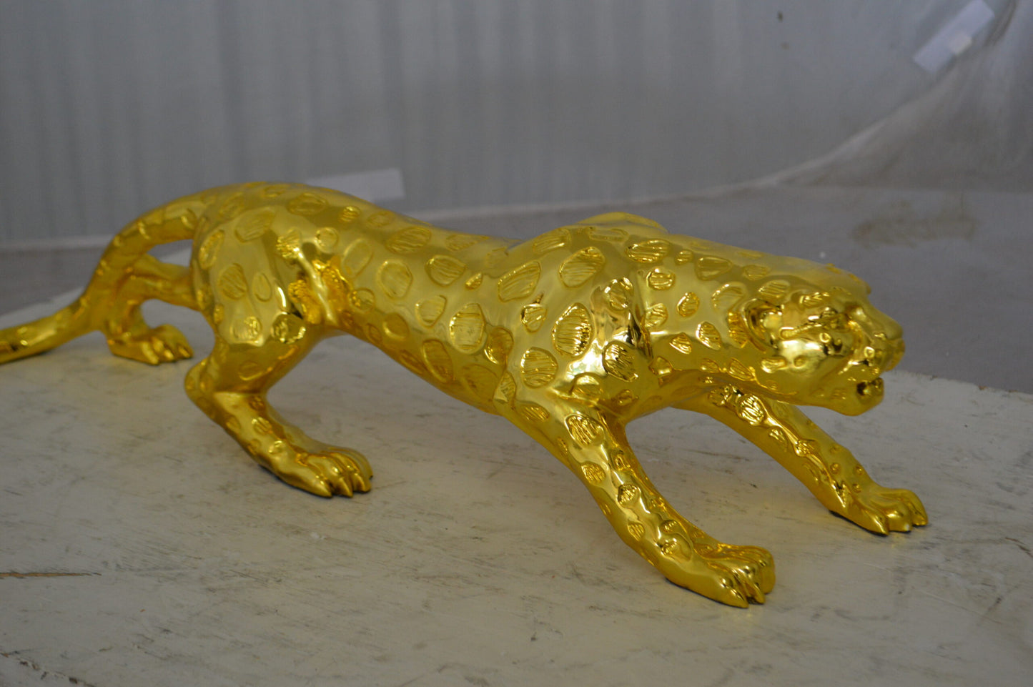 Modern Art Gold Jaguar Statue Made of Resin - Size: 23"L x 6"W x 7"H.