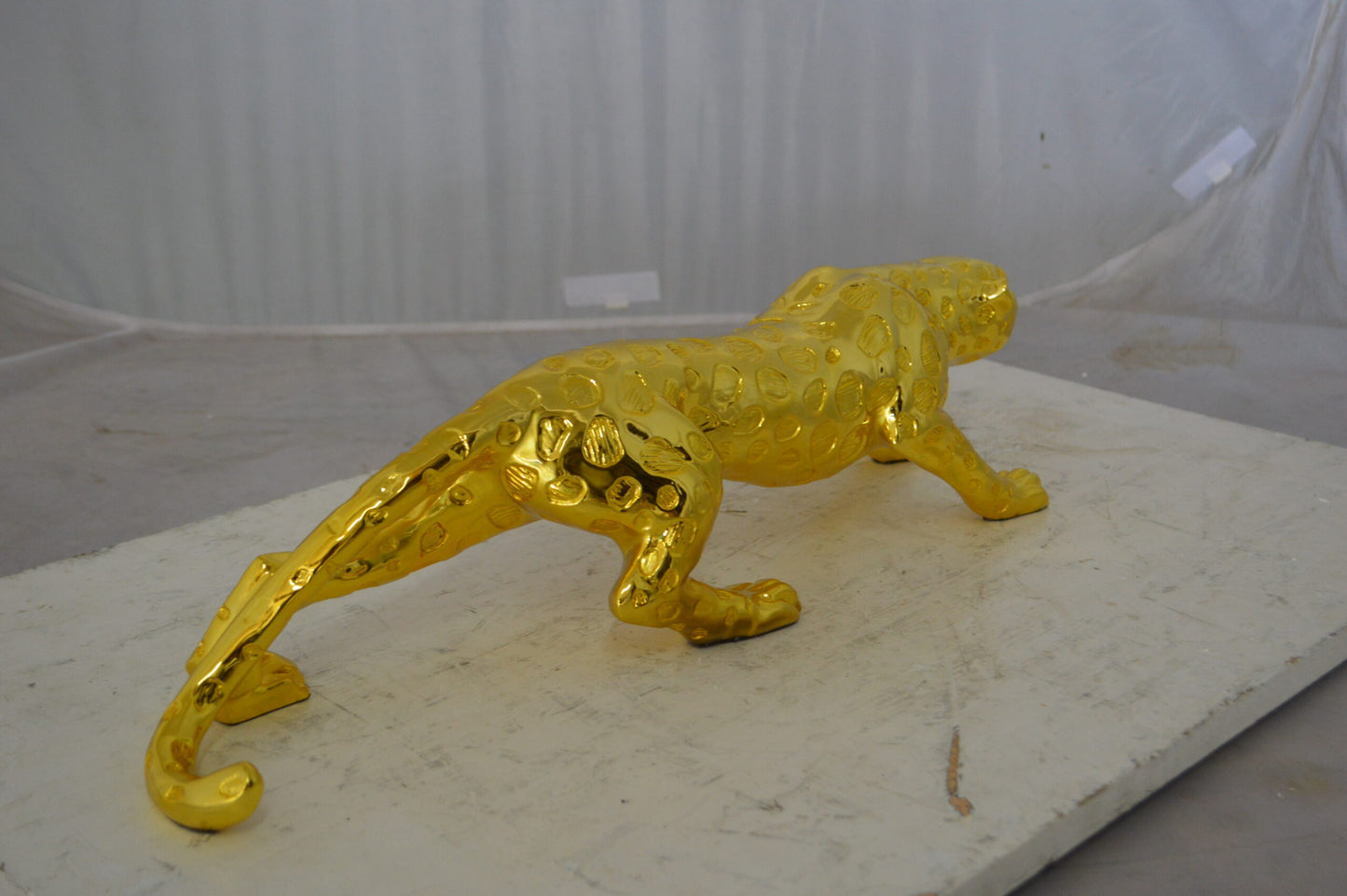 Modern Art Gold Jaguar Statue Made of Resin - Size: 23"L x 6"W x 7"H.