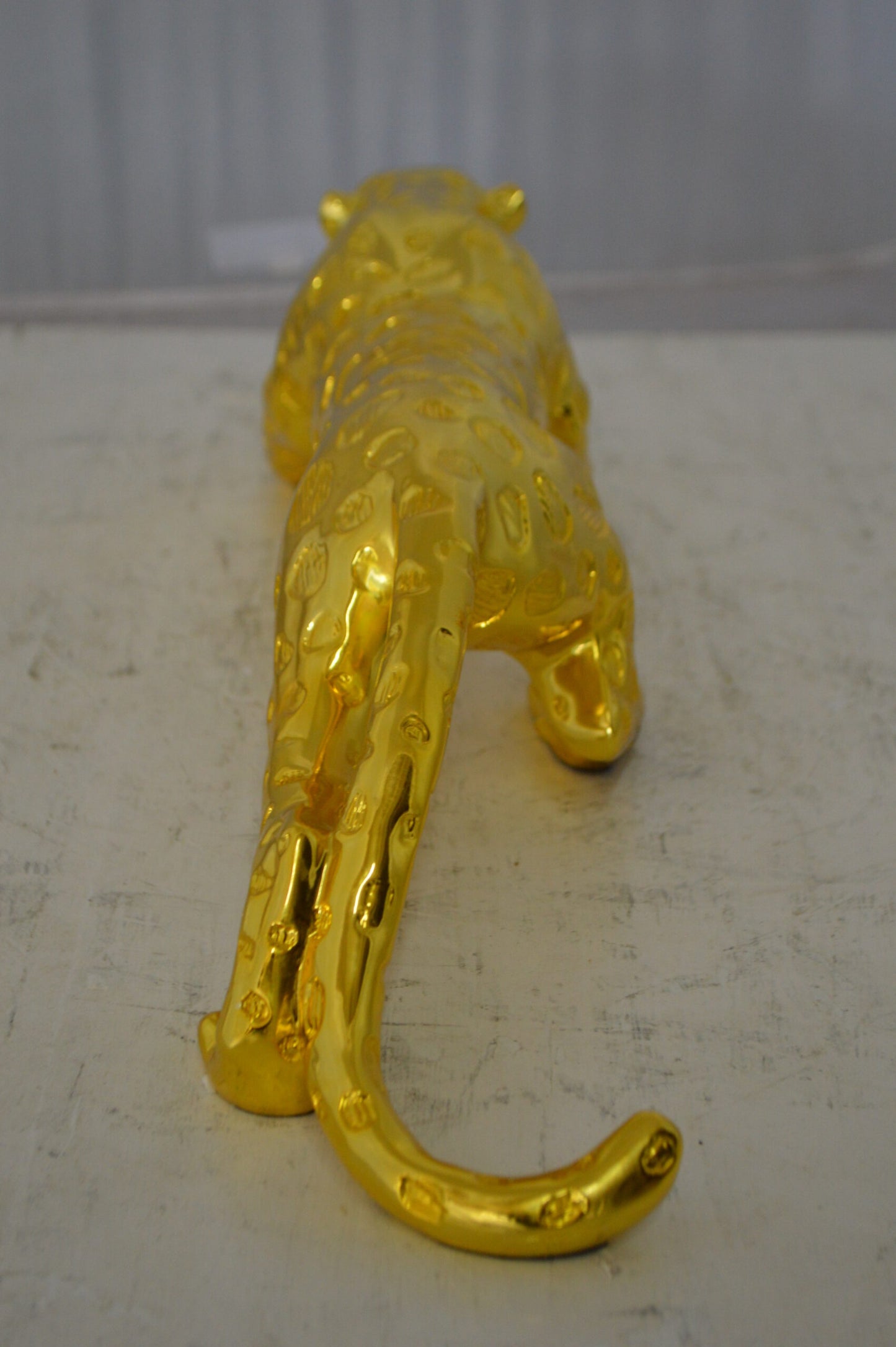 Modern Art Gold Jaguar Statue Made of Resin - Size: 23"L x 6"W x 7"H.