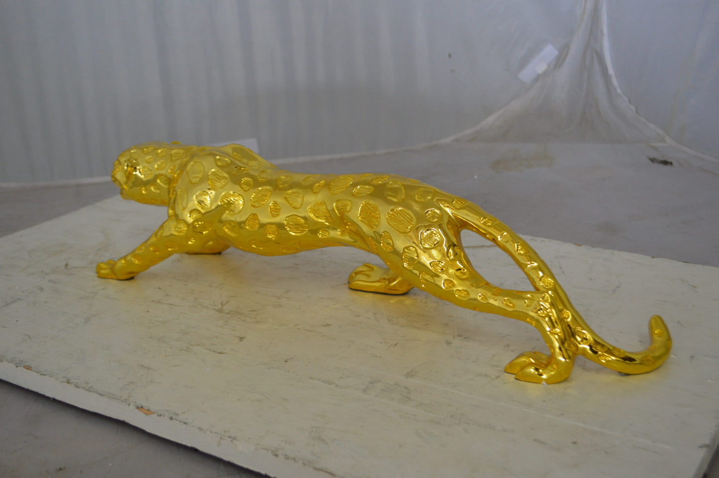 Modern Art Gold Jaguar Statue Made of Resin - Size: 23"L x 6"W x 7"H.