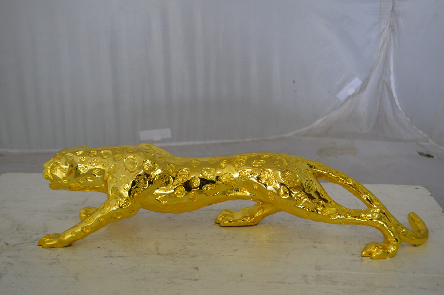 Modern Art Gold Jaguar Statue Made of Resin - Size: 23"L x 6"W x 7"H.