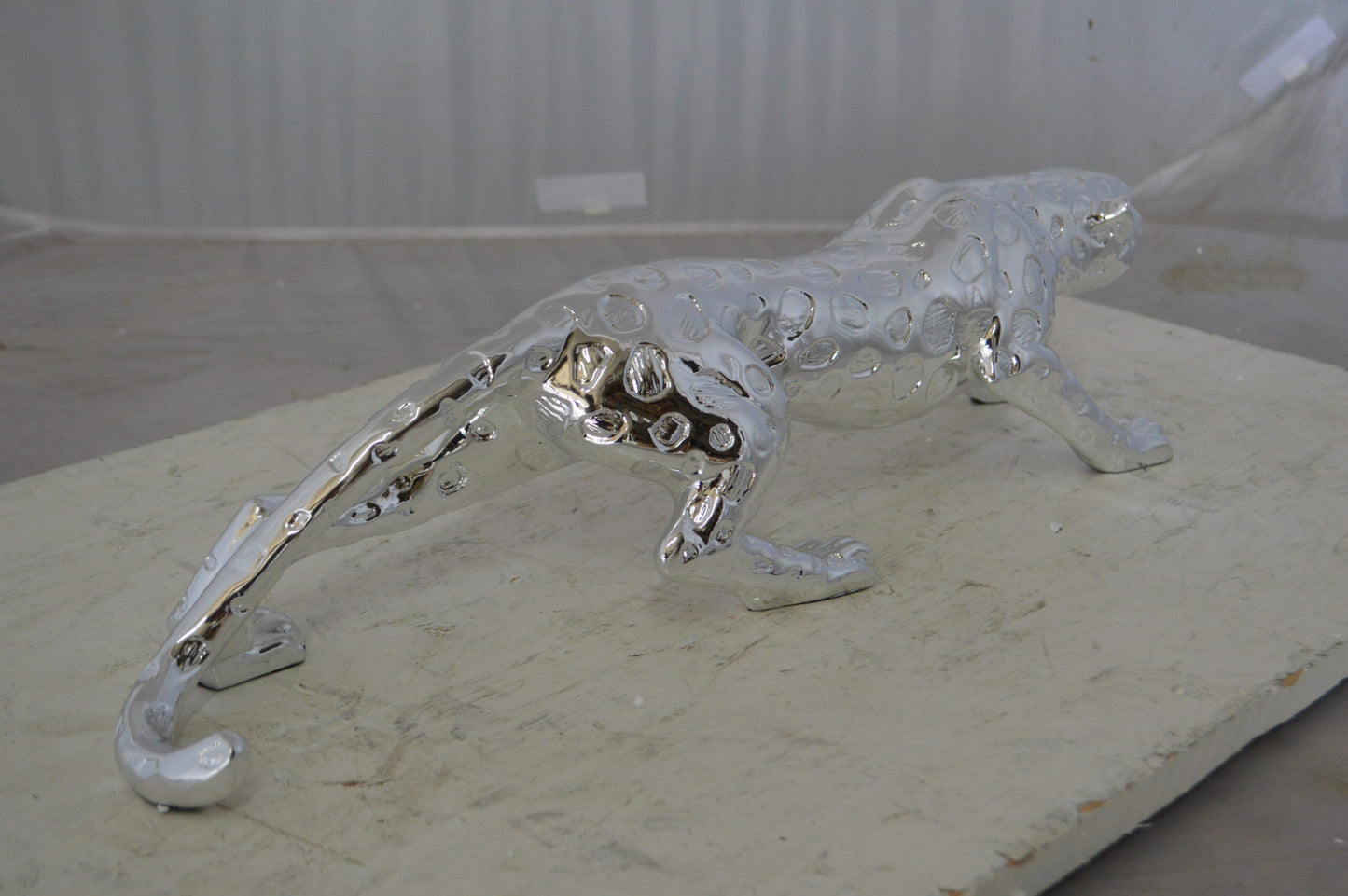 Modern Art Silver Jaguar Statue Made of Resin - Size: 23"L x 6"W x 7"H.