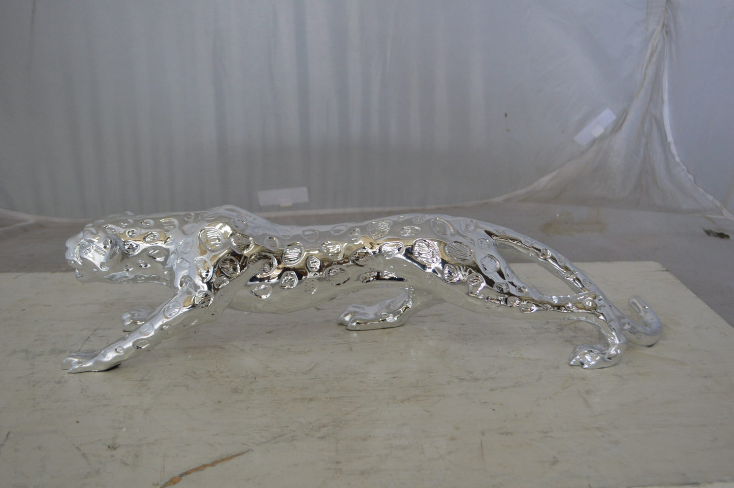 Modern Art Silver Jaguar Statue Made of Resin - Size: 23"L x 6"W x 7"H.