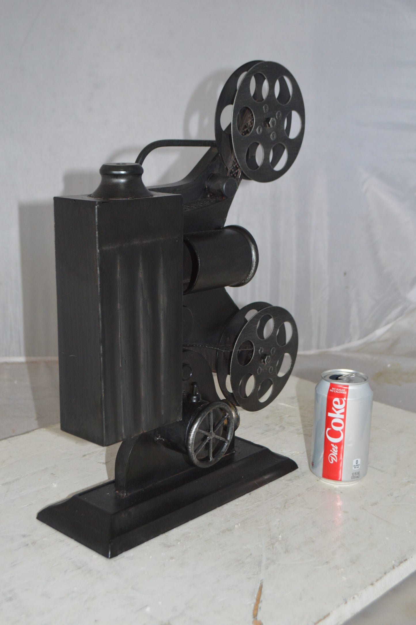 Movie Reel Abstract Metal Statue - Size: 13"L x 4"W x 19"H.
