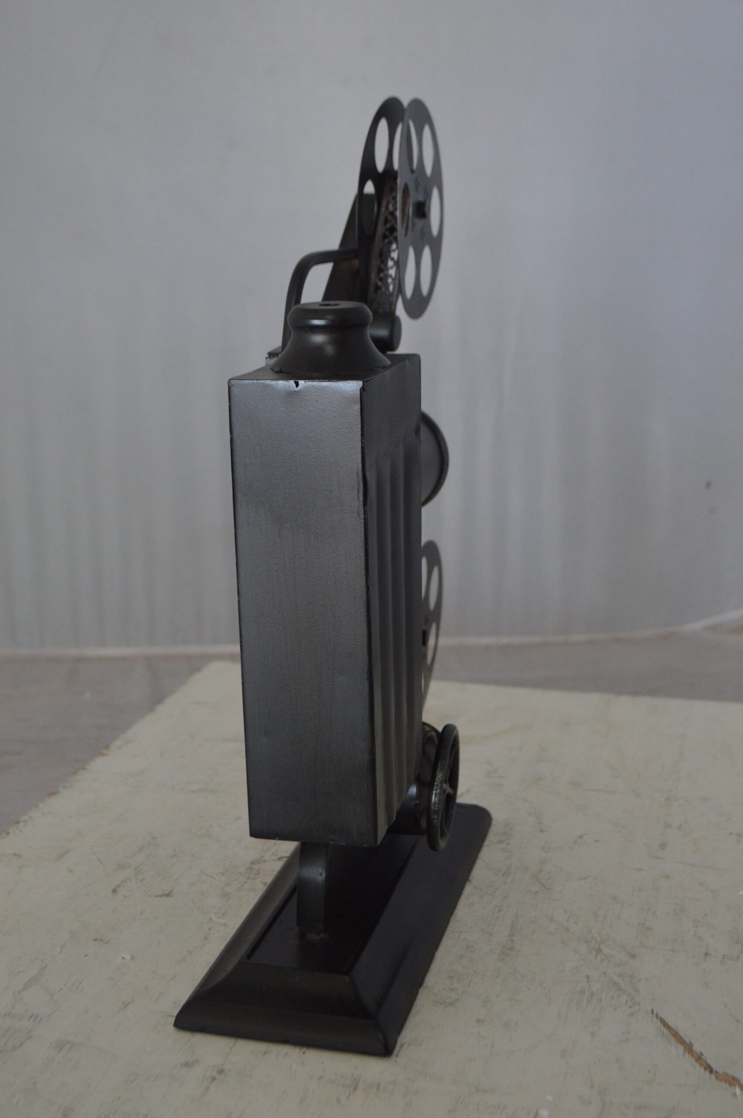 Movie Reel Abstract Metal Statue - Size: 13"L x 4"W x 19"H.