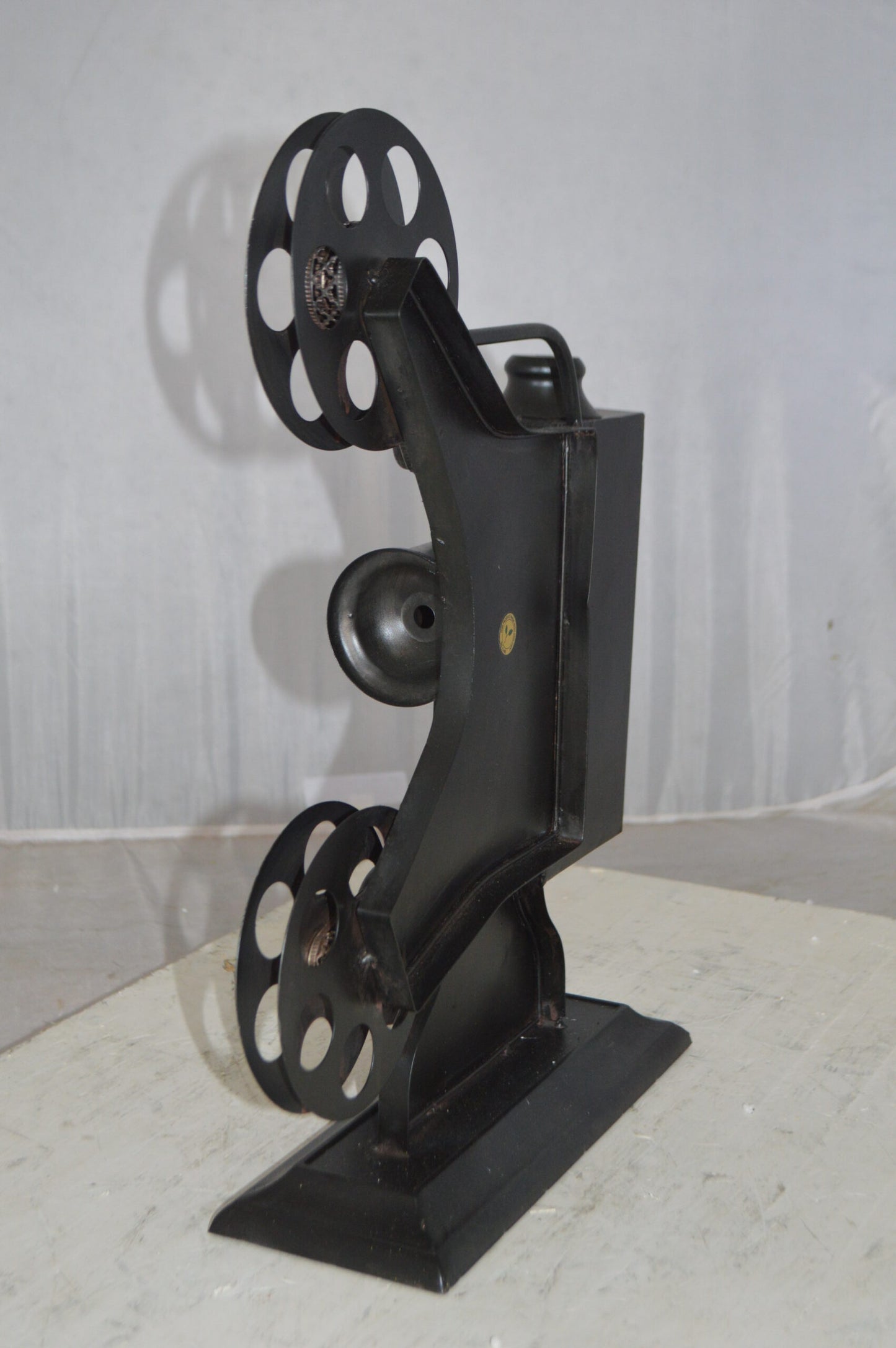 Movie Reel Abstract Metal Statue - Size: 13"L x 4"W x 19"H.