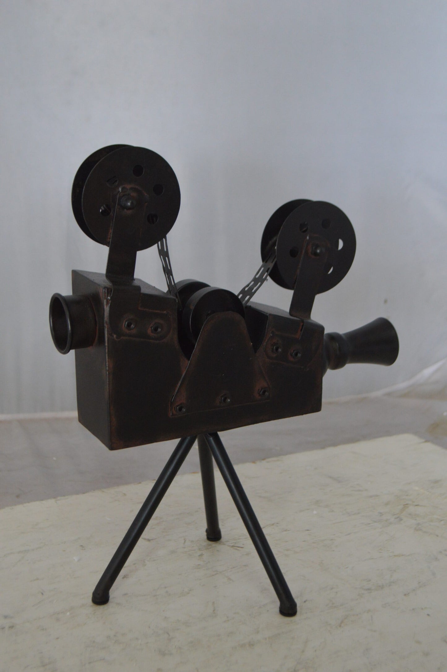 Movie Reel Abstract Metal Statue on tripod - Size: 12"L x 6"W x 15"H.