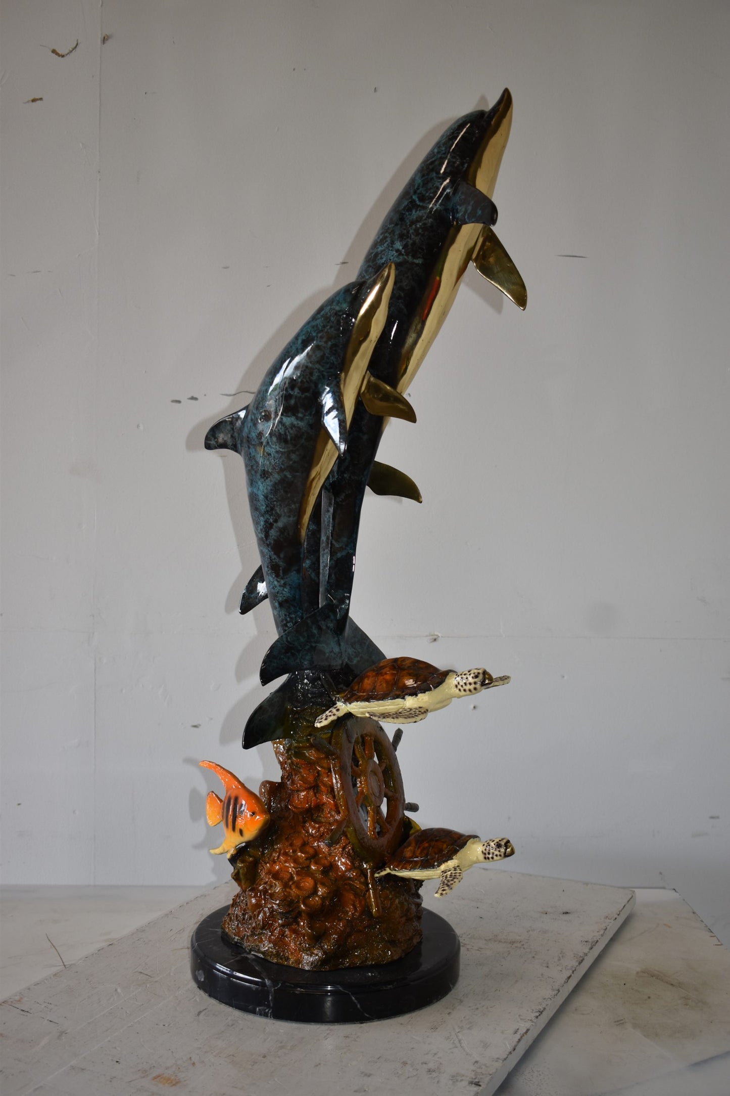 Three Dolphins Turtles and Boat Wheel Bronze Statue Size: 17" x 13" x 40"H