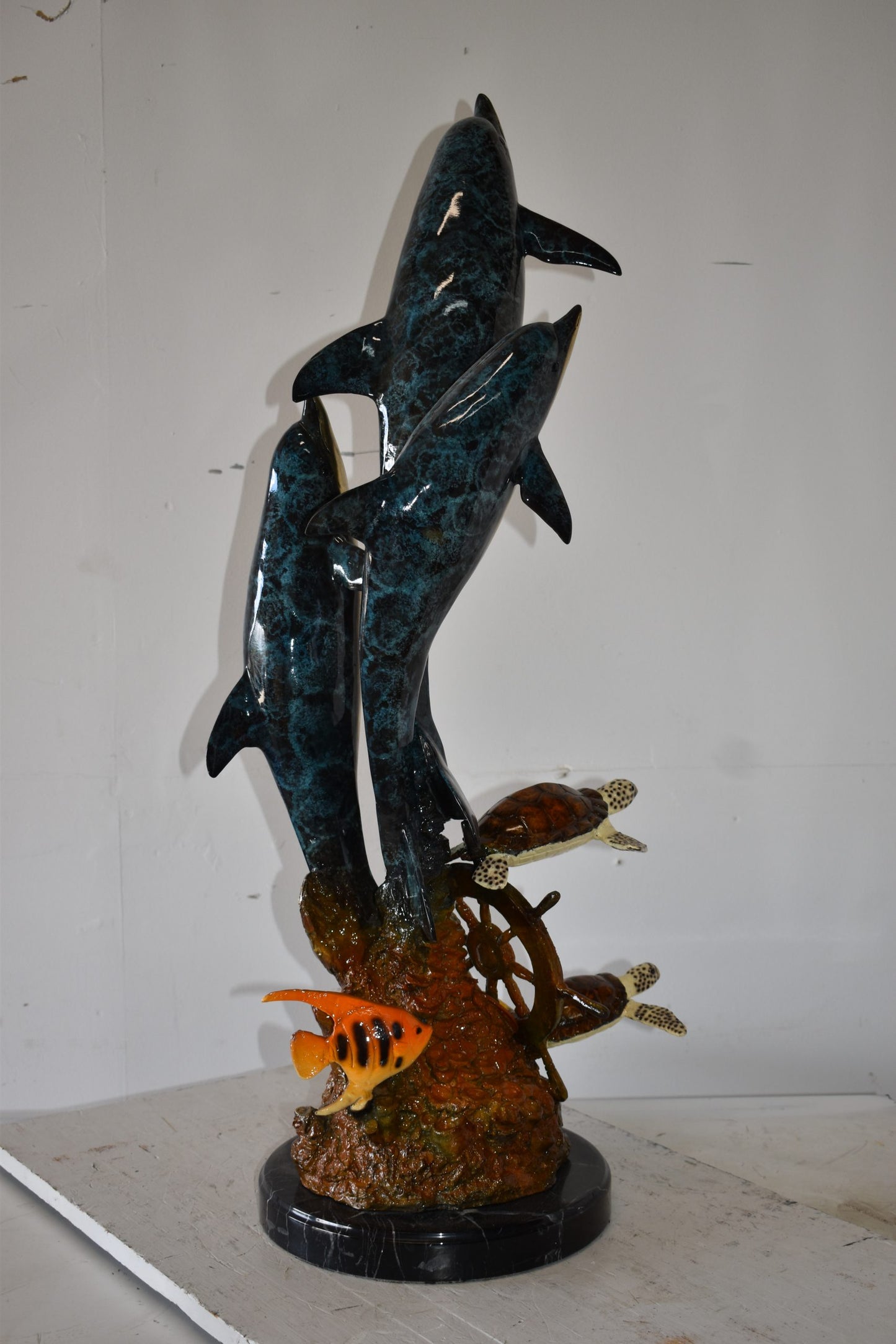 Three Dolphins Turtles and Boat Wheel Bronze Statue Size: 17" x 13" x 40"H