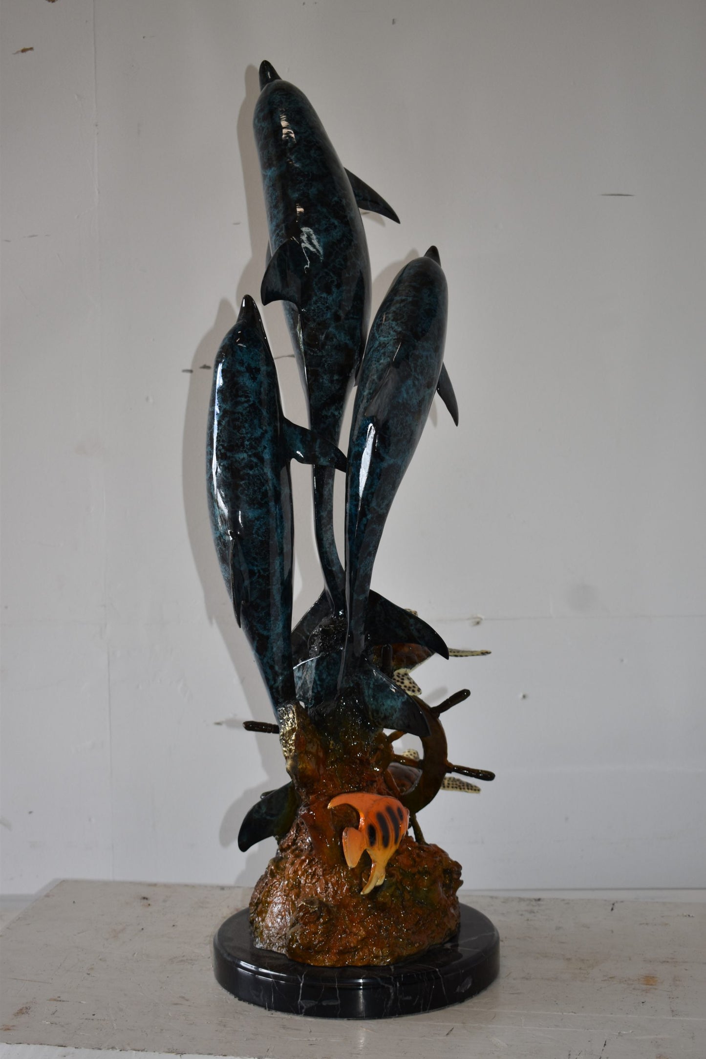 Three Dolphins Turtles and Boat Wheel Bronze Statue Size: 17" x 13" x 40"H