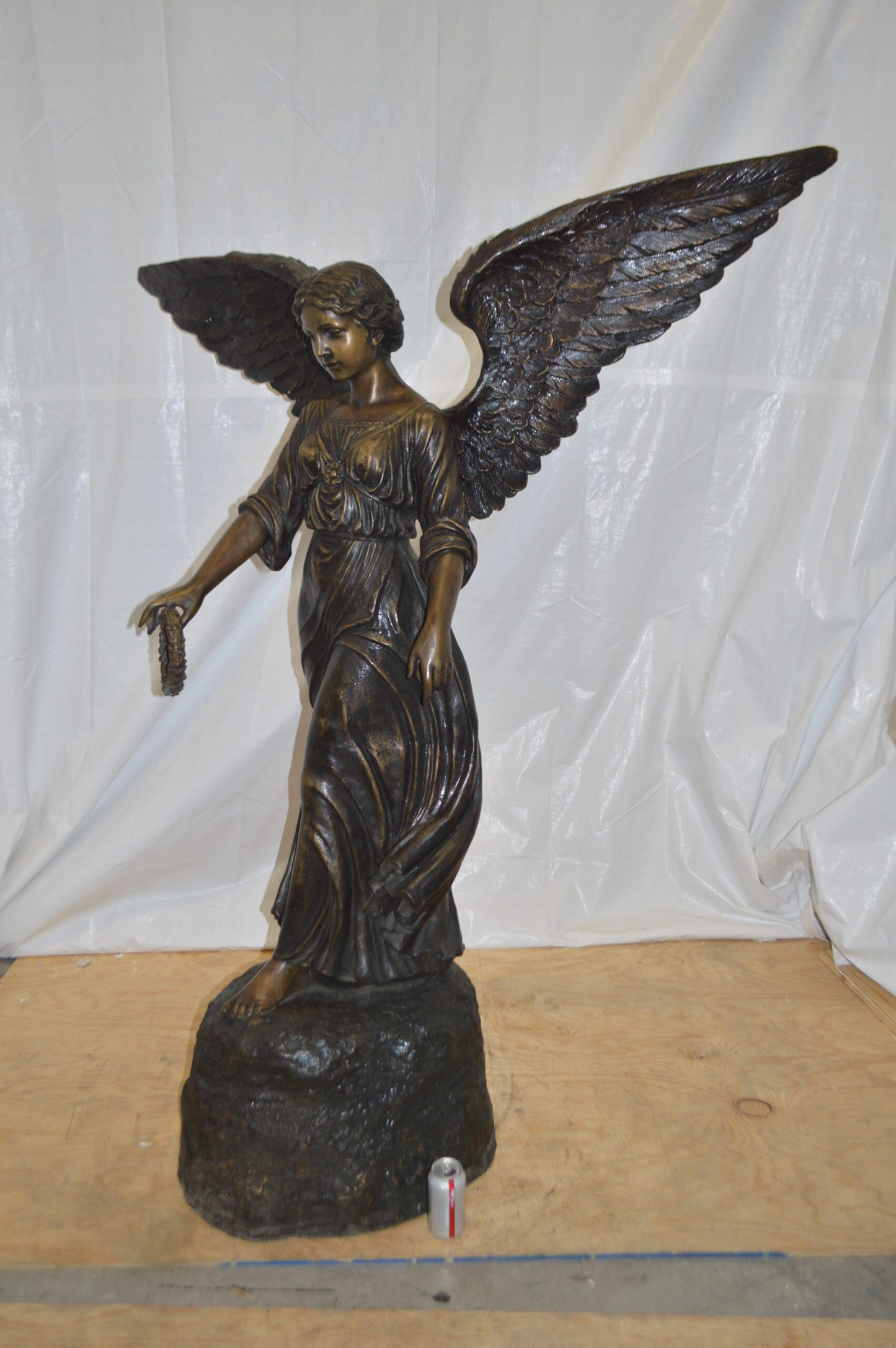 Angel Standing on a Rock Bronze Statue - Size: 60"L x 36"W x 71"H.