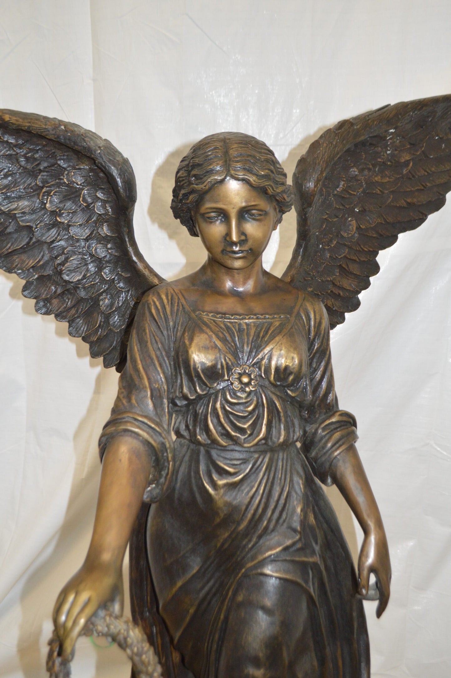 Angel Standing on a Rock Bronze Statue - Size: 60"L x 36"W x 71"H.