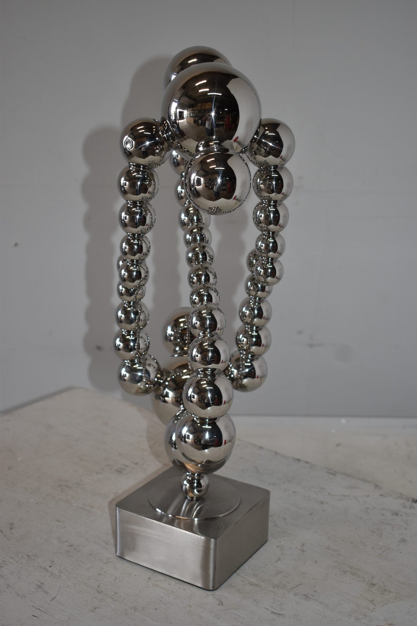 Modern Art of Acrobats in Action Made of Chrome Balls Size: 12" x 8" x 23"H