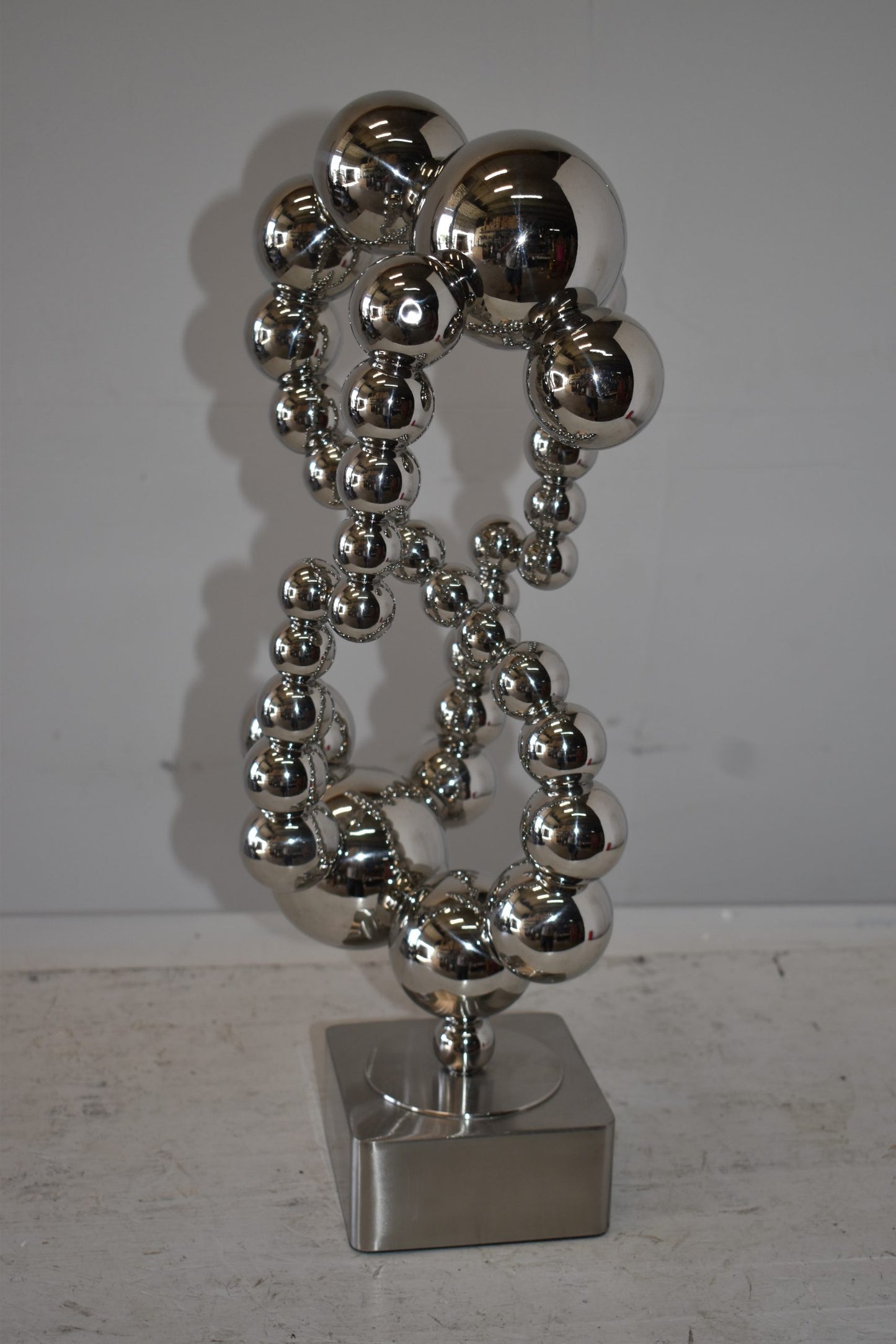 Modern Art of Acrobats in Action Made of Chrome Balls Size: 12" x 8" x 23"H